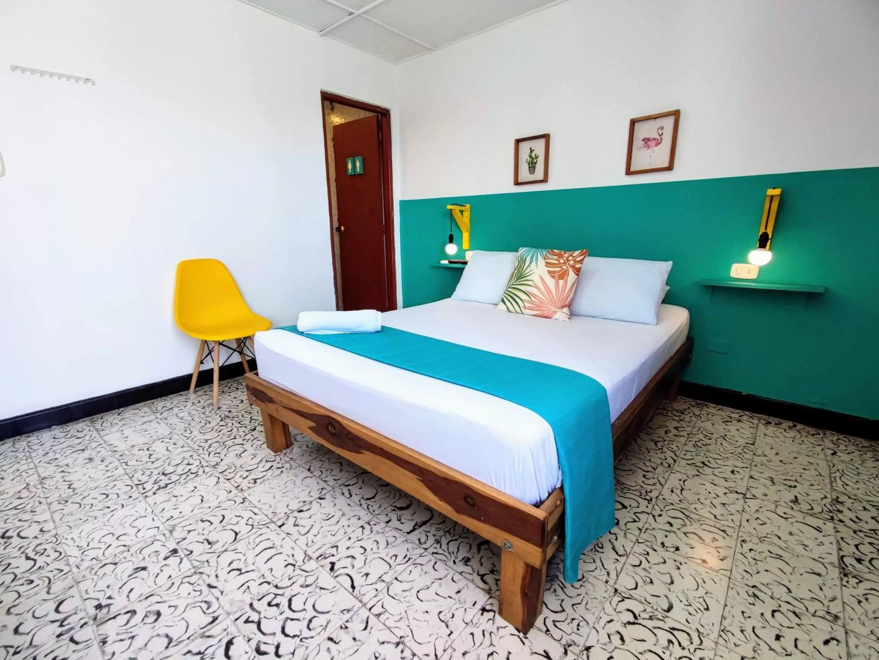 Bed in Bona Vida Hotel