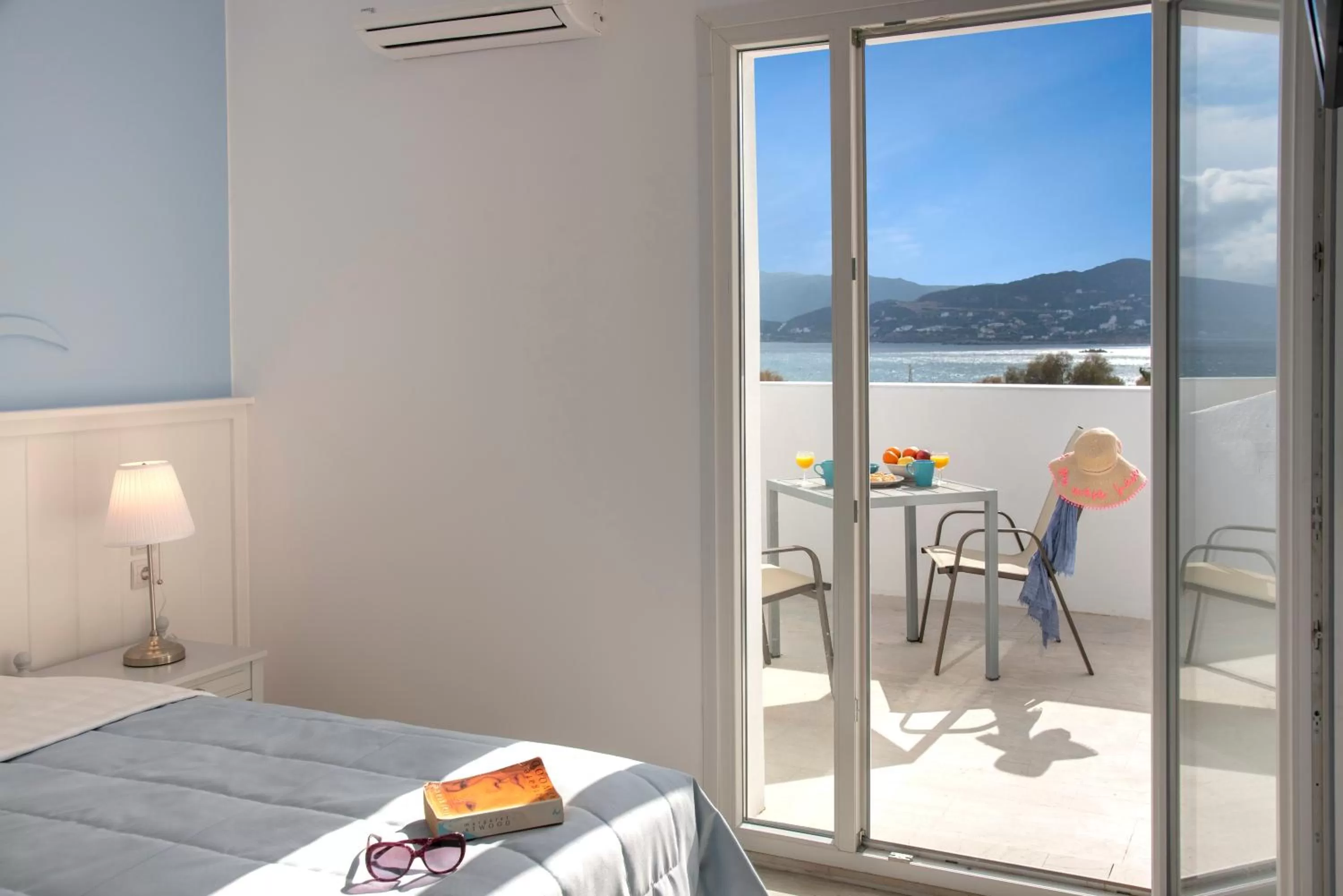 Bed in Naiades Marina Hotel