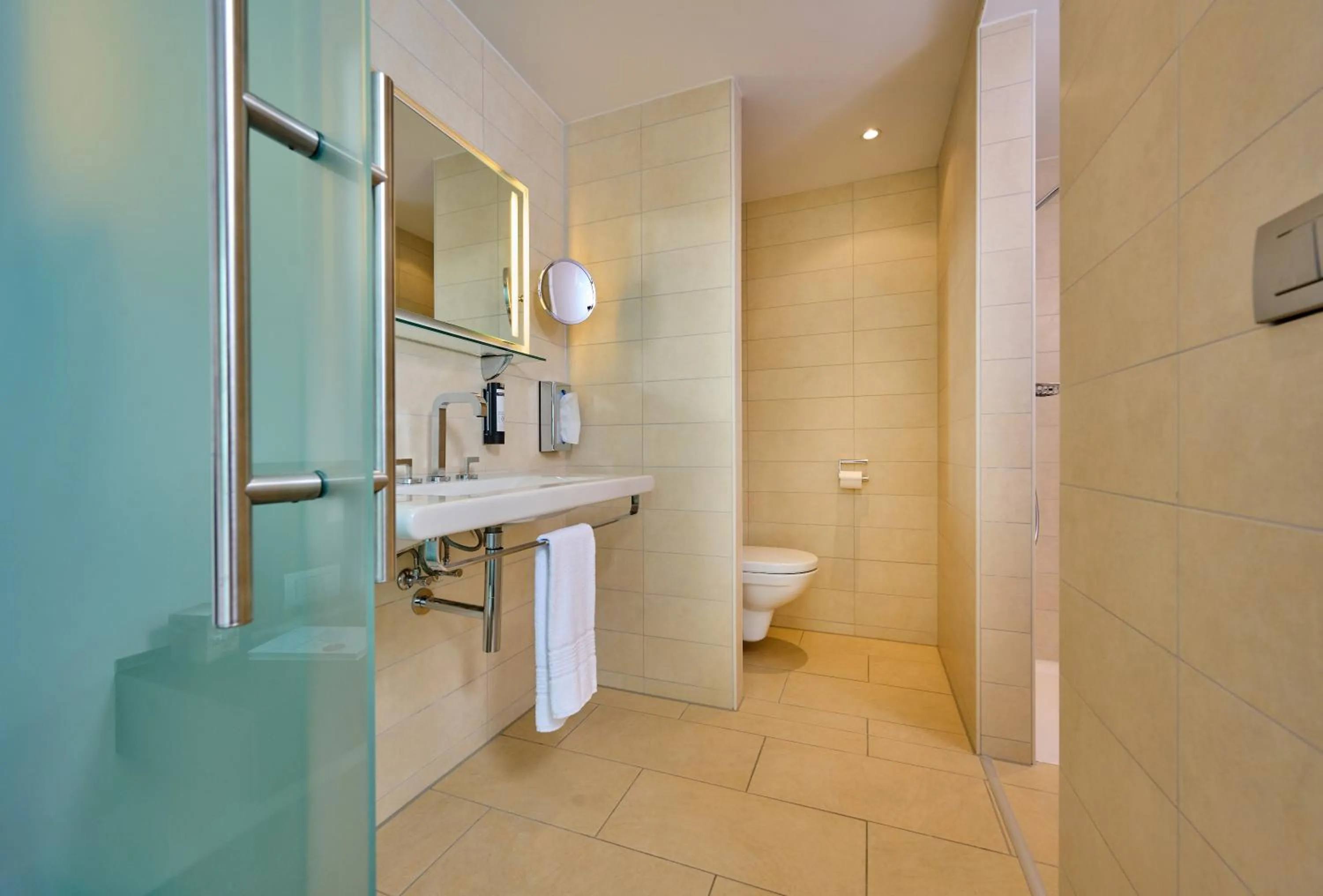 Bathroom in Asam Hotel