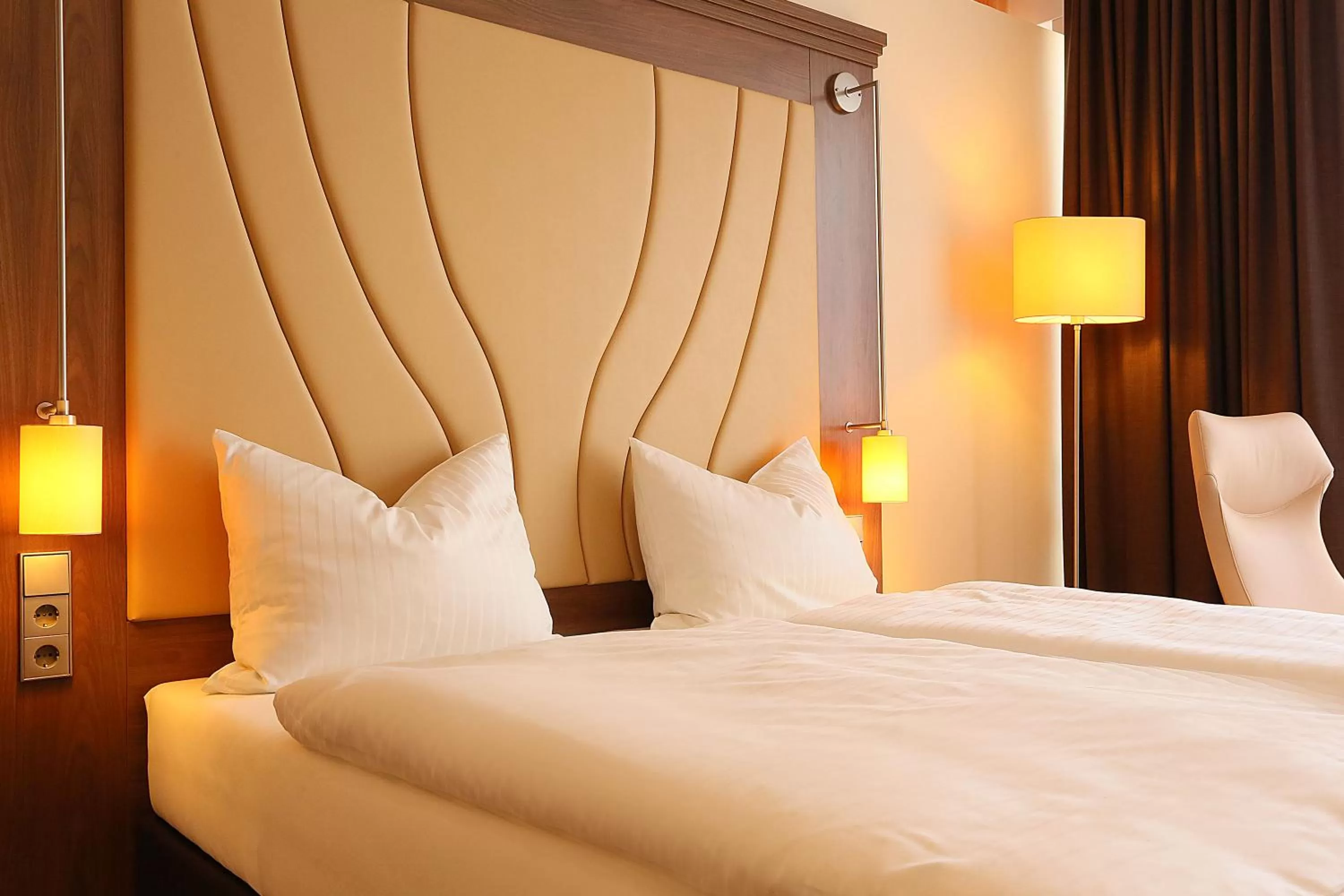 Bed in Naam Hotel & Apartments Frankfurt City-Messe Airport