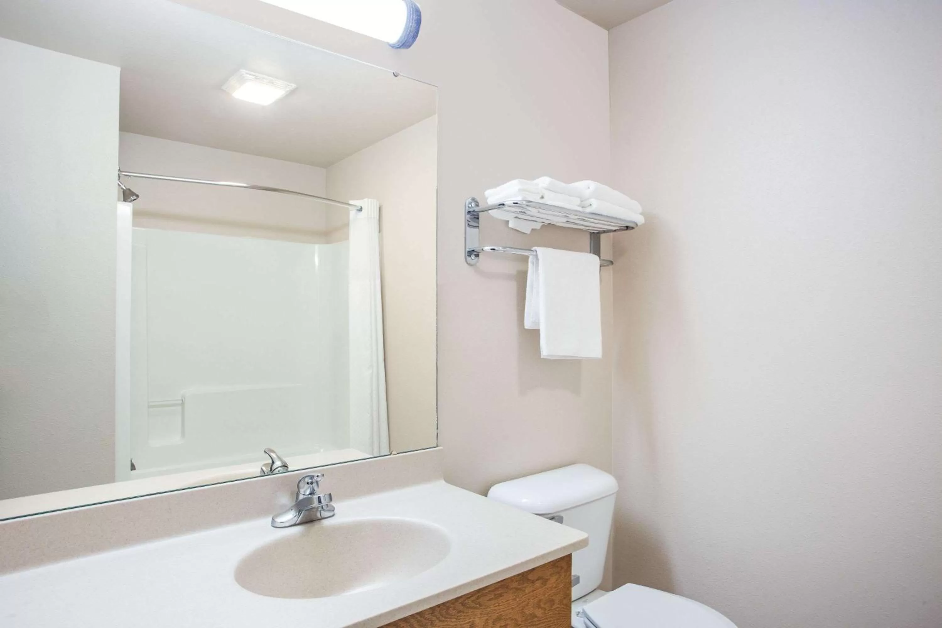 Bathroom in Super 8 by Wyndham Monroe WI