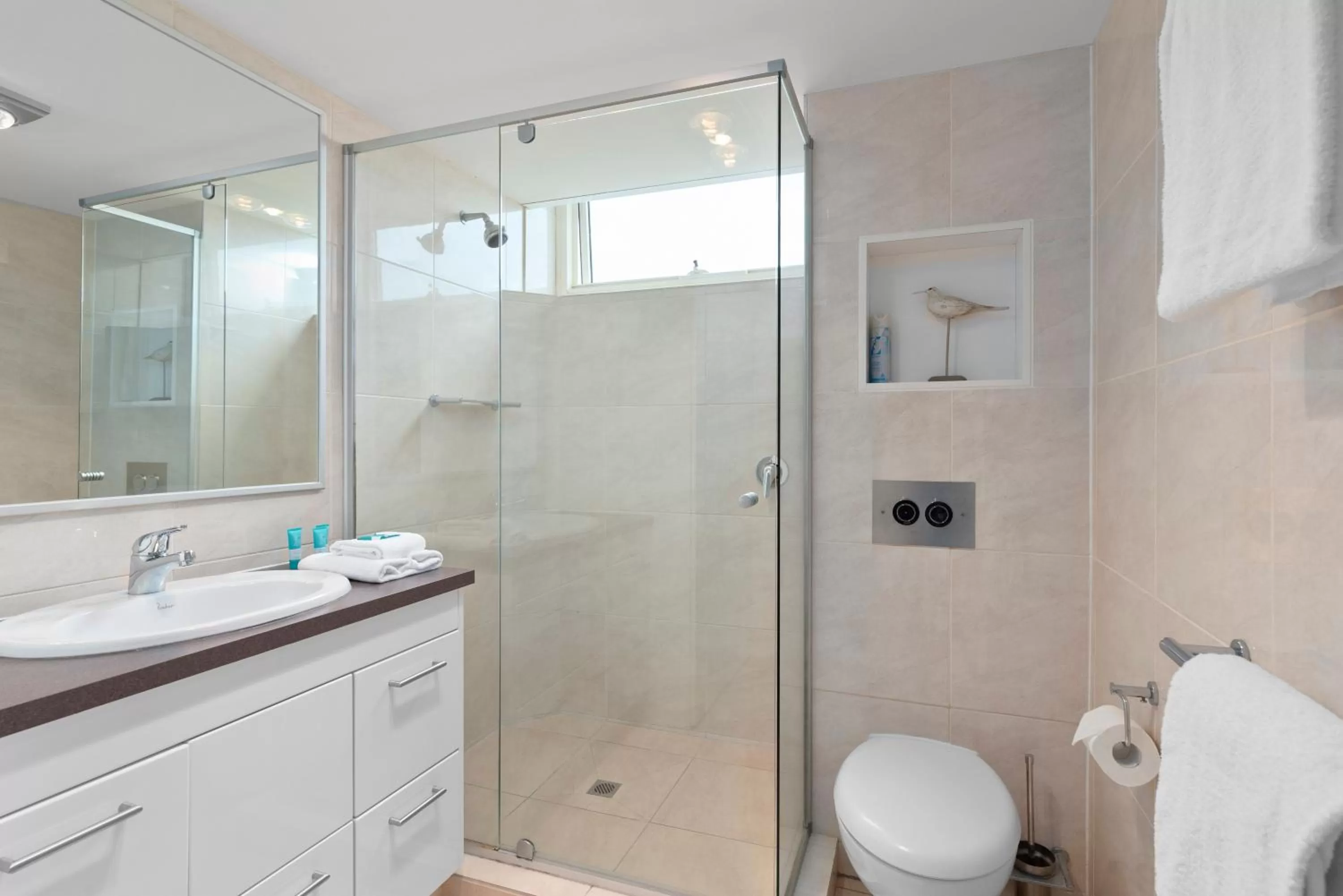 Shower in 84 The Spit Holiday Apartments