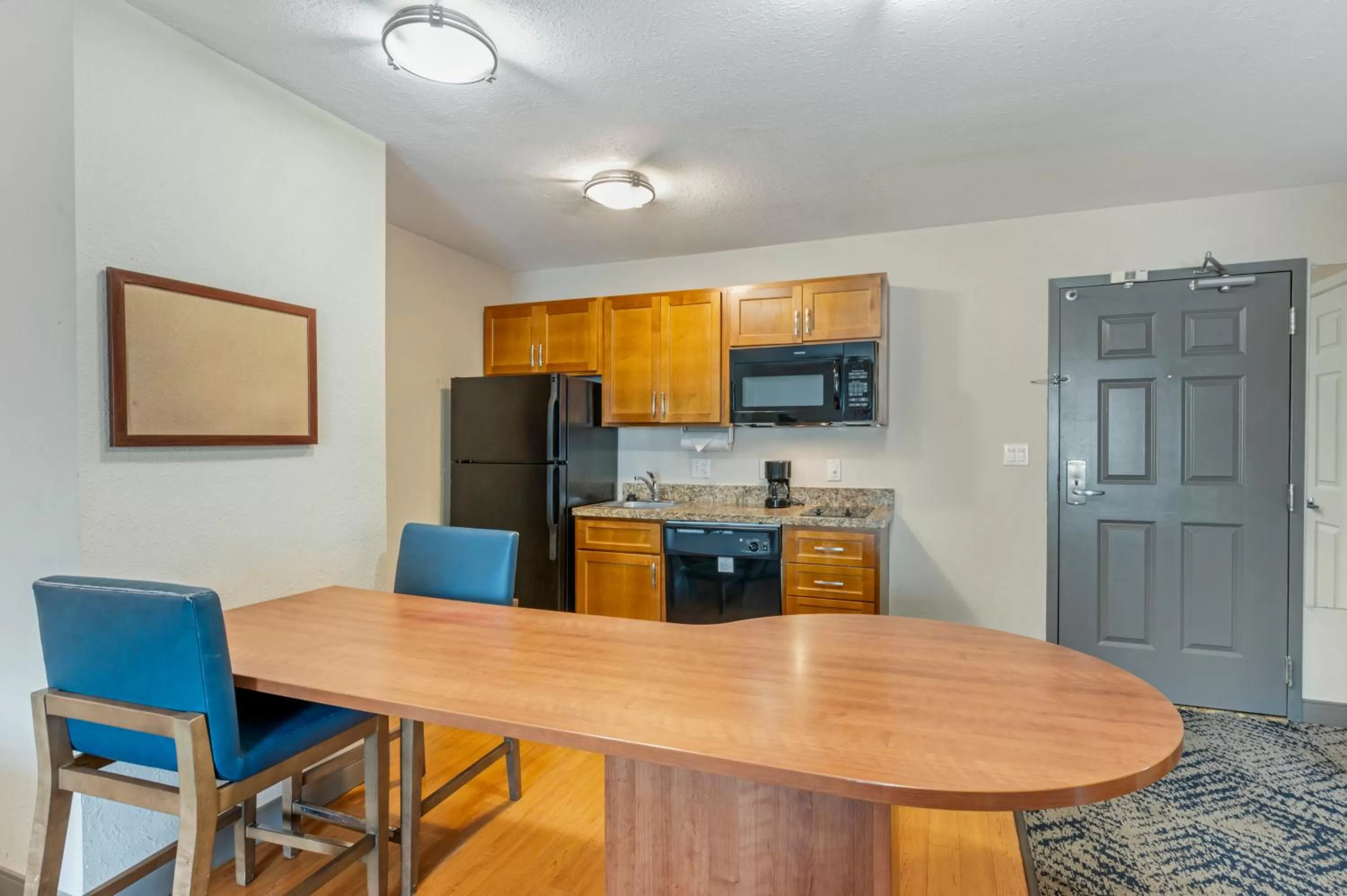 Kitchen or kitchenette in Candlewood Suites Indianapolis East by IHG