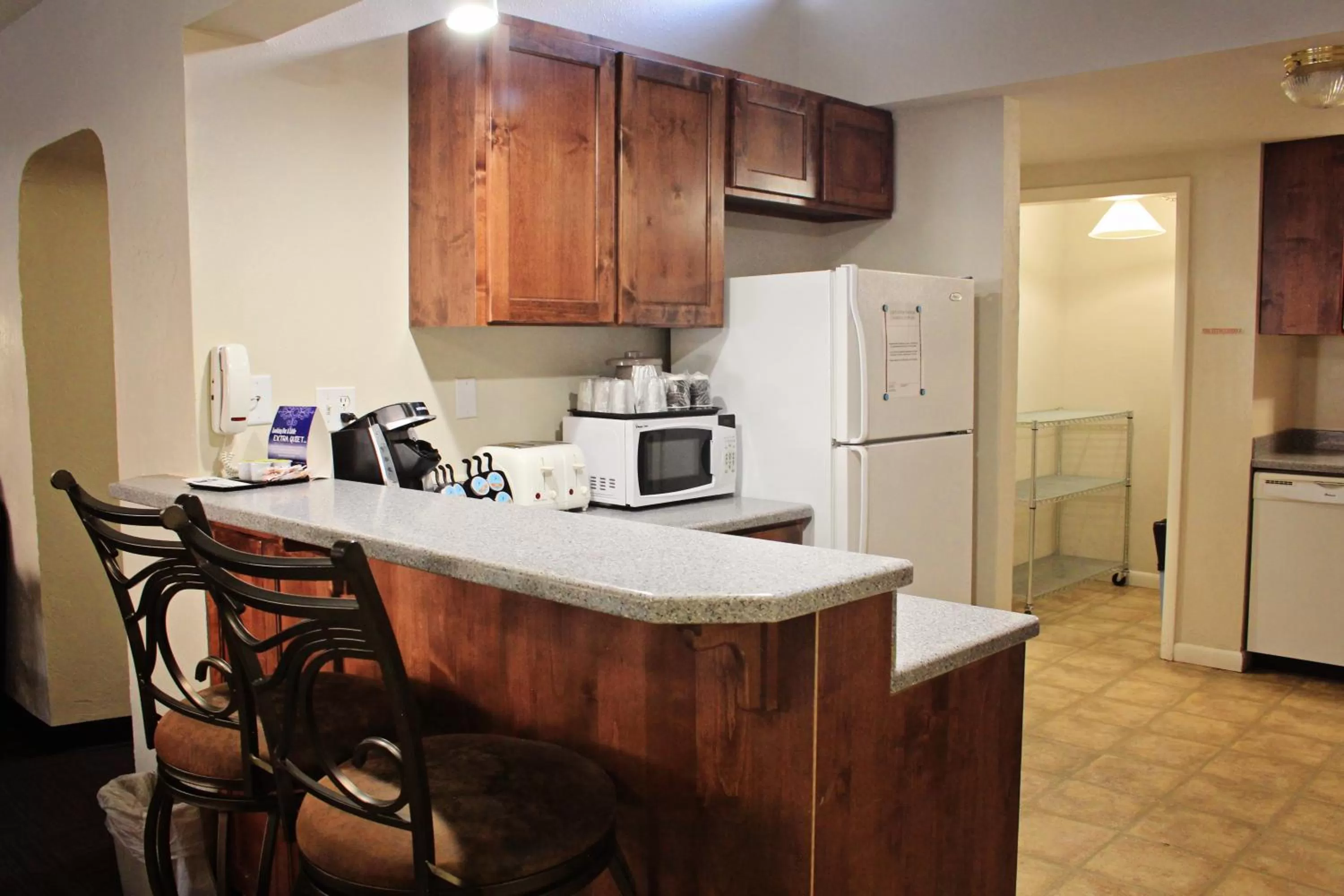Kitchen or kitchenette in Bowen Motel