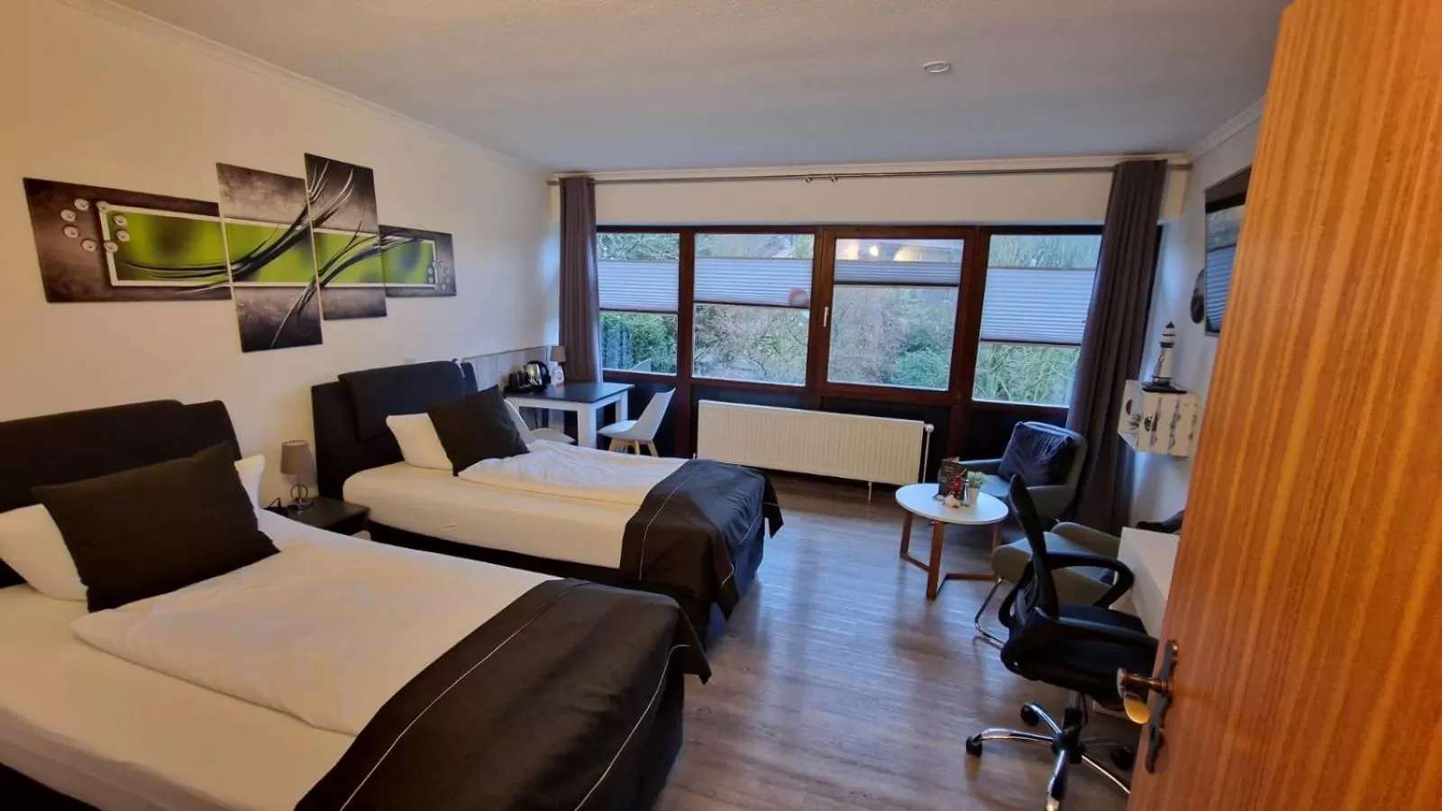 Photo of the whole room, Bed in Hotel Seeblick am Sankelmarker See - Natur und Erholung