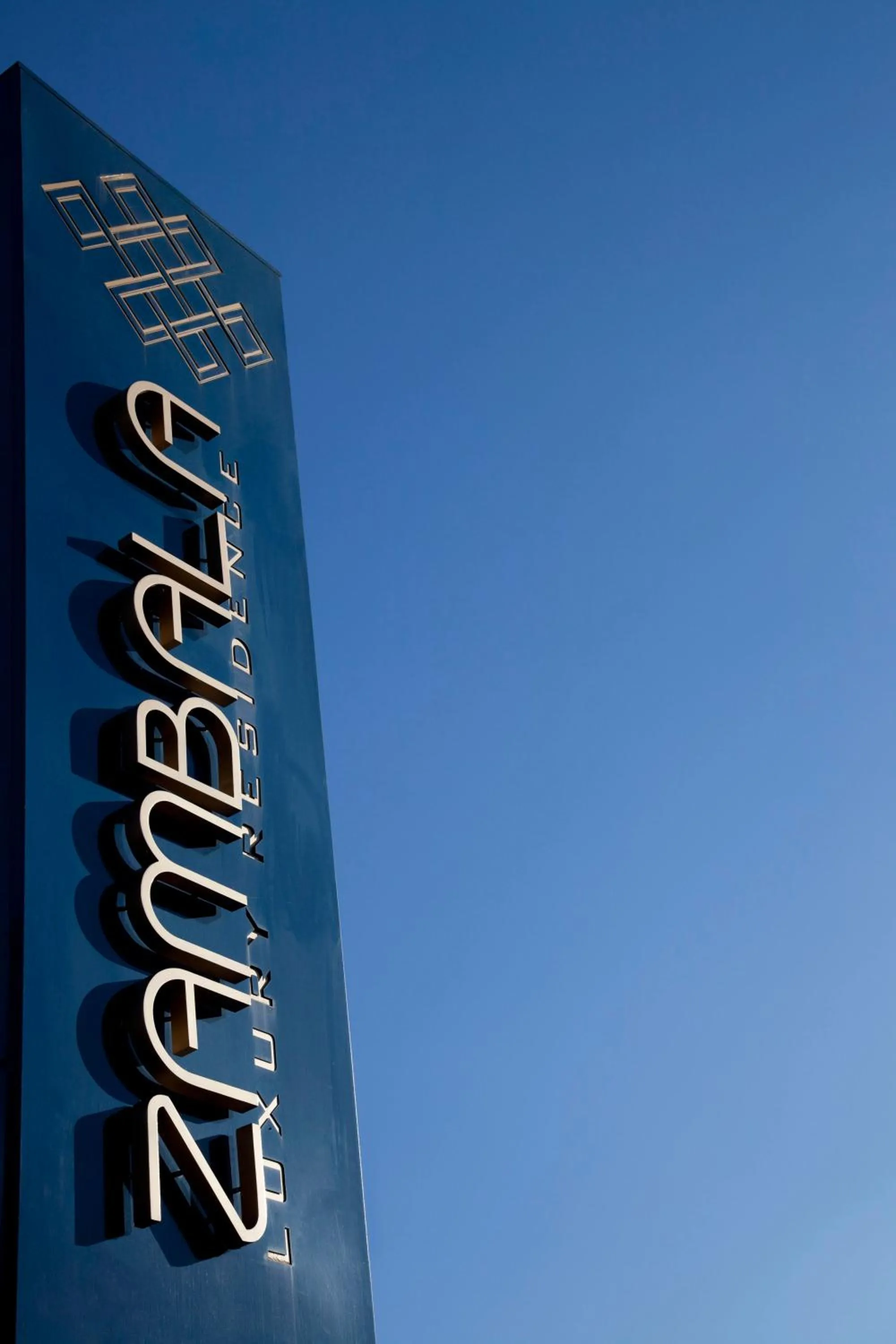 Property logo or sign in Zambala Luxury Apartments