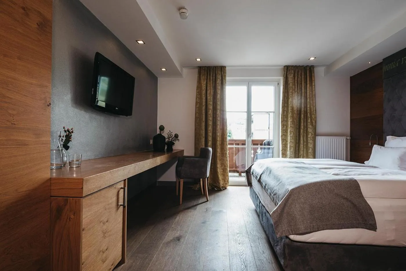 Photo of the whole room, Bed in Sonnhof Alpendorf - an adults only place