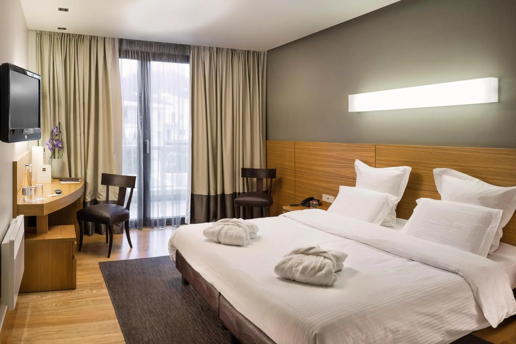 Bed in Esperos Palace Luxury & Spa Hotel