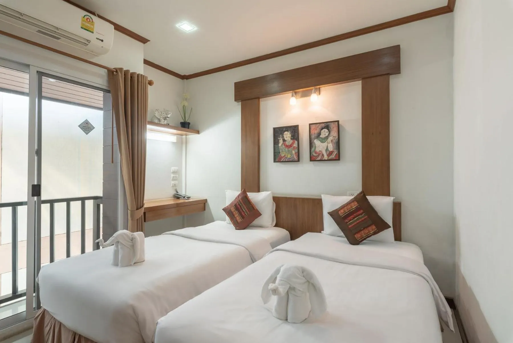 Photo of the whole room, Bed in Cozytel Chiangmai