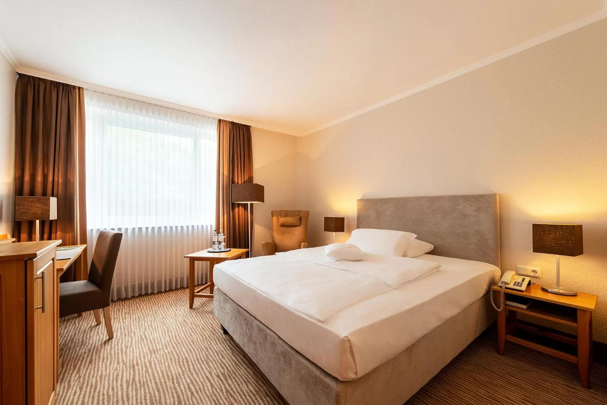 Bed in MUNTE - Wellnesshotel am Stadtwald