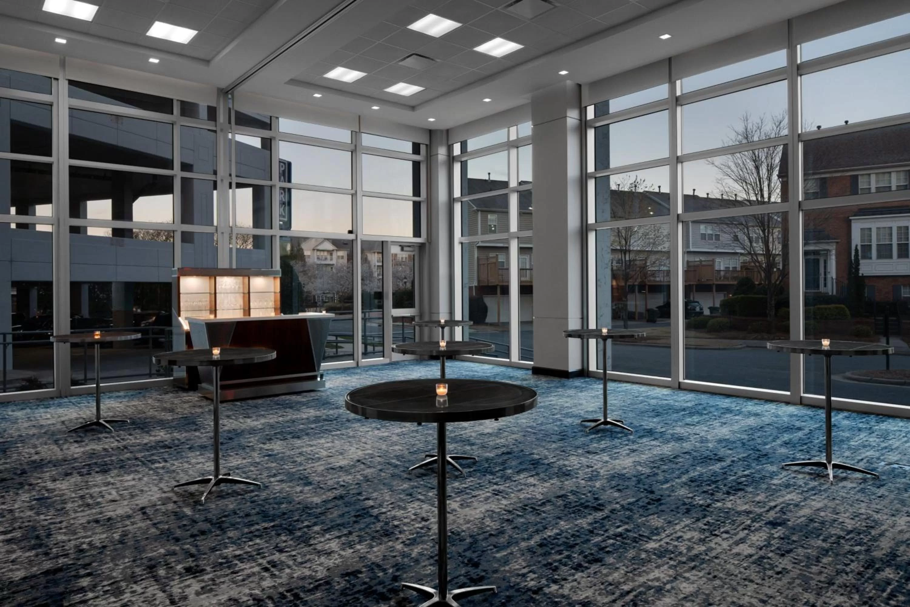Lobby or reception in AC Hotel by Marriott Charlotte Ballantyne