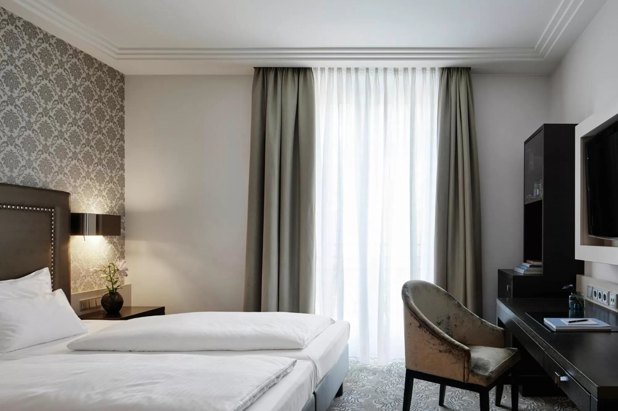 Bed in Hotel Maximilian’s