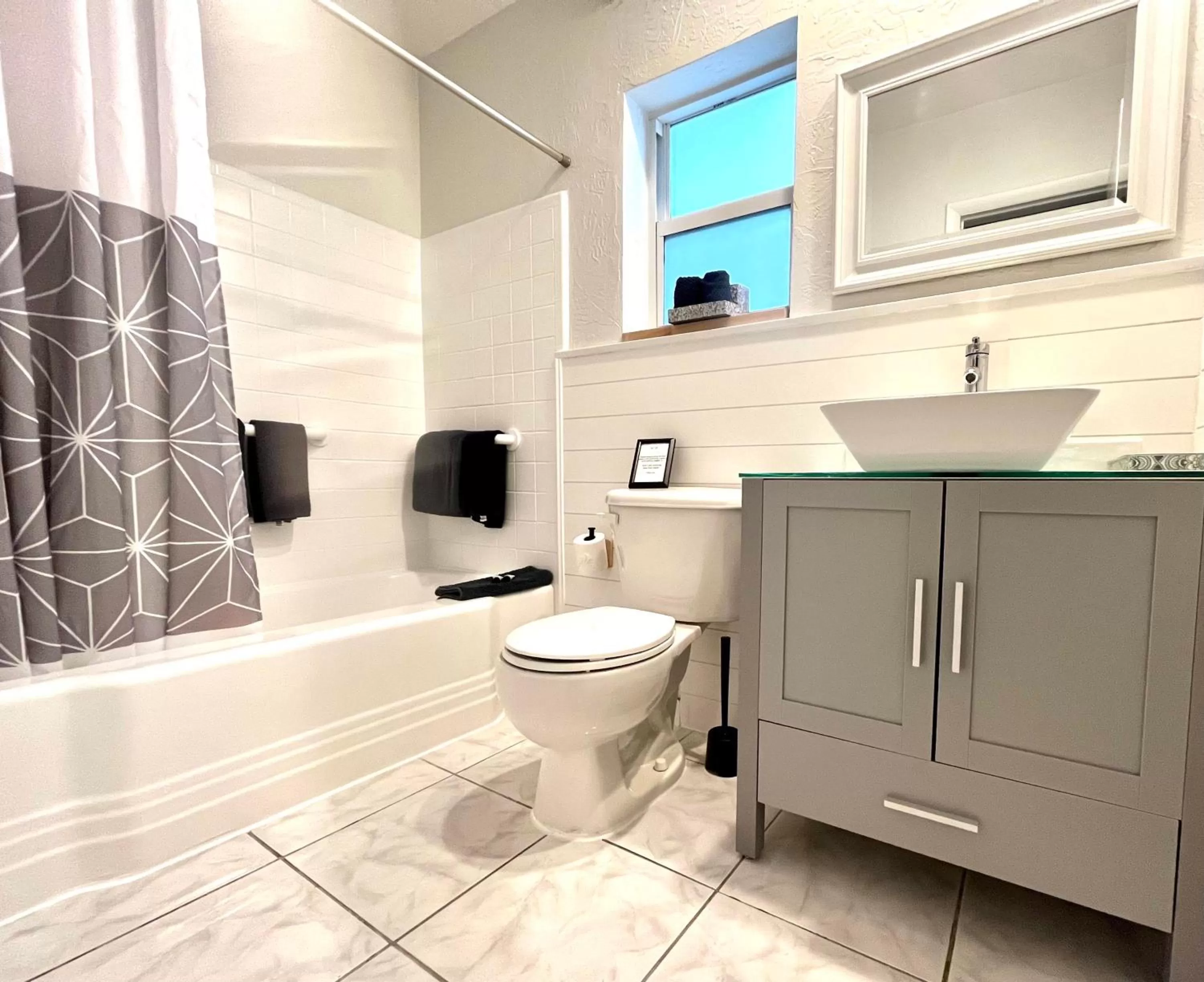 Bathroom in 4145 By The Sea Inn & Suites