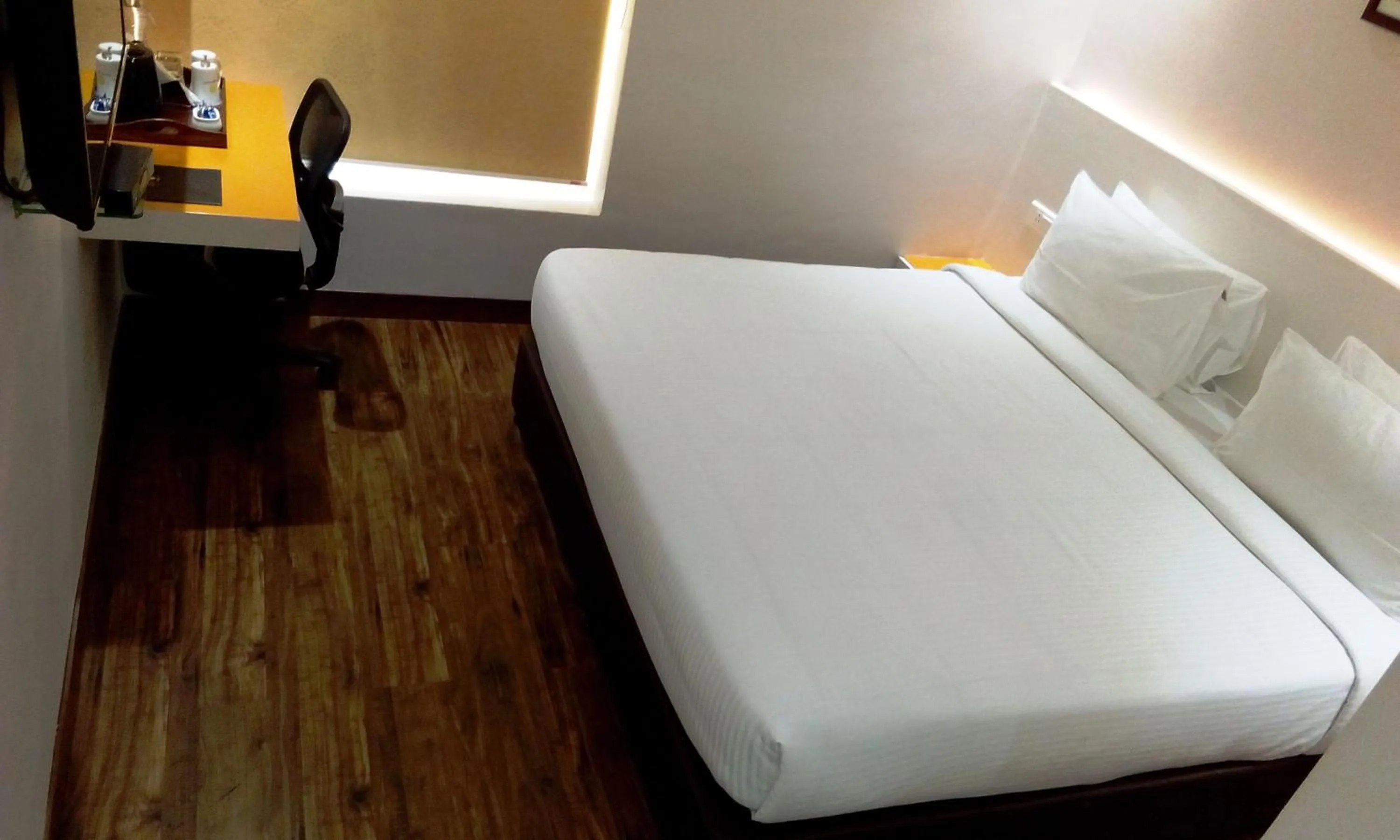 Photo of the whole room, Bed in Mango Hotels Prangan