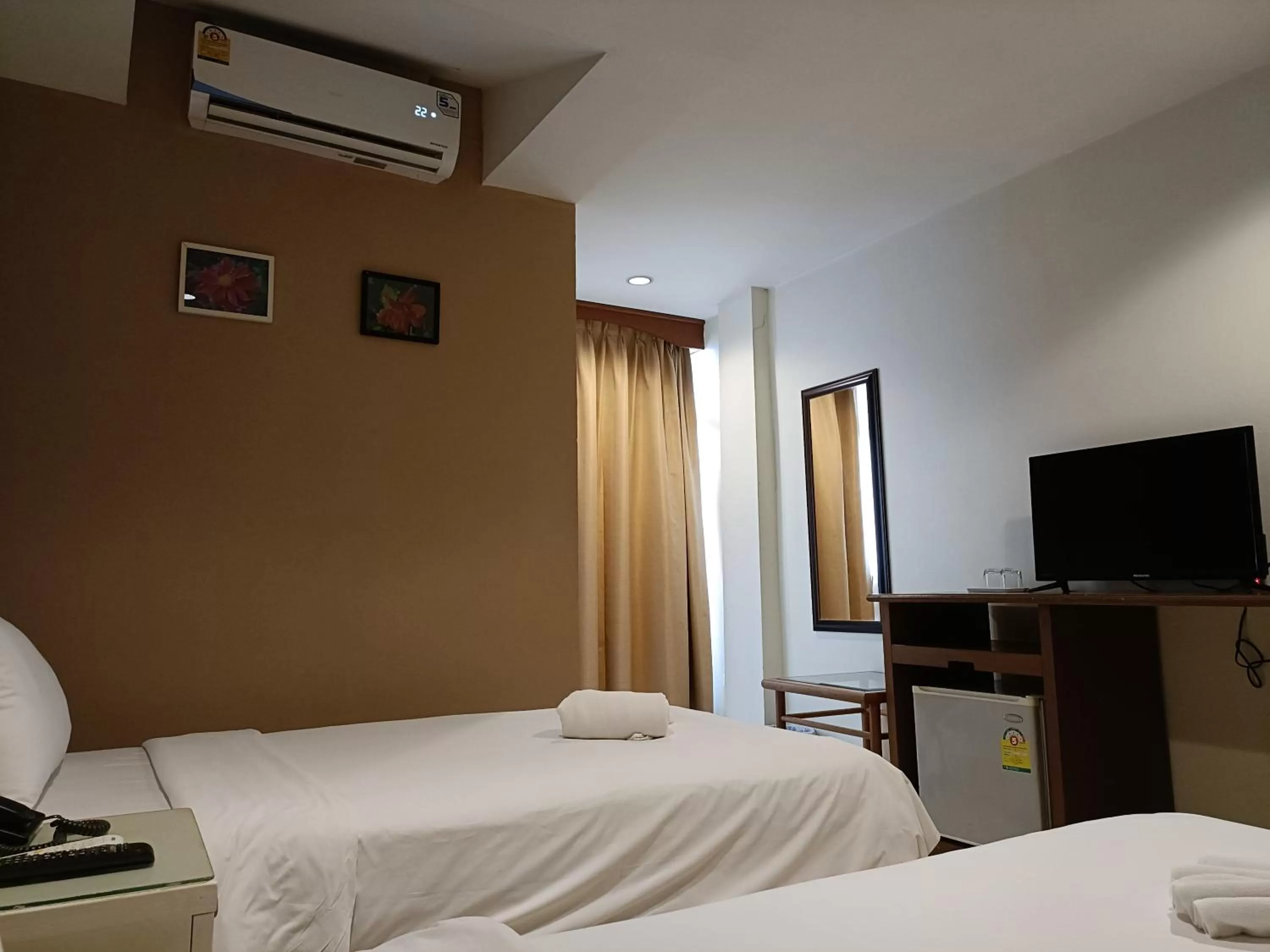 Bed in JL Bangkok Hotel