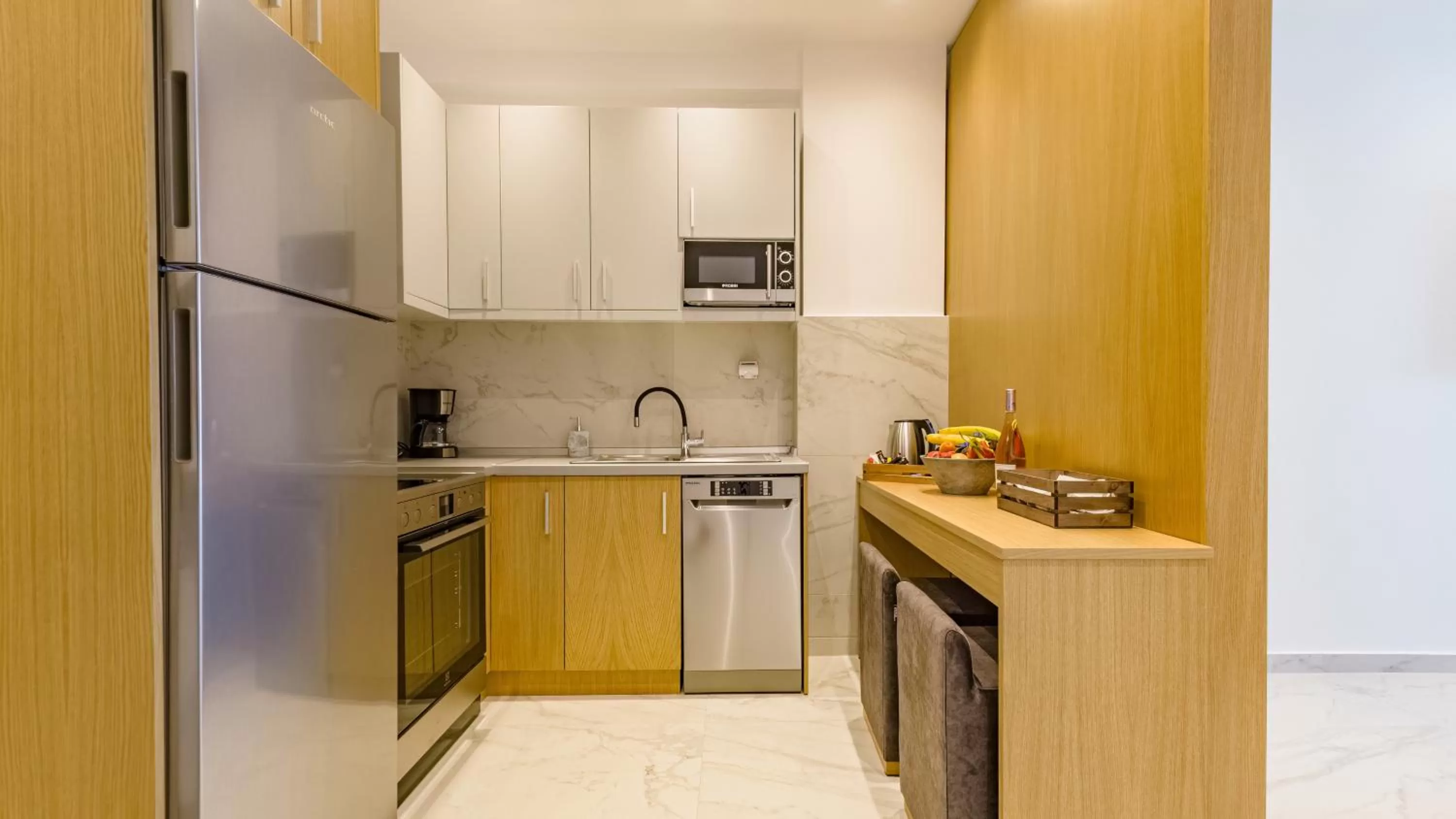 Kitchen or kitchenette in Kima Premium Apartments