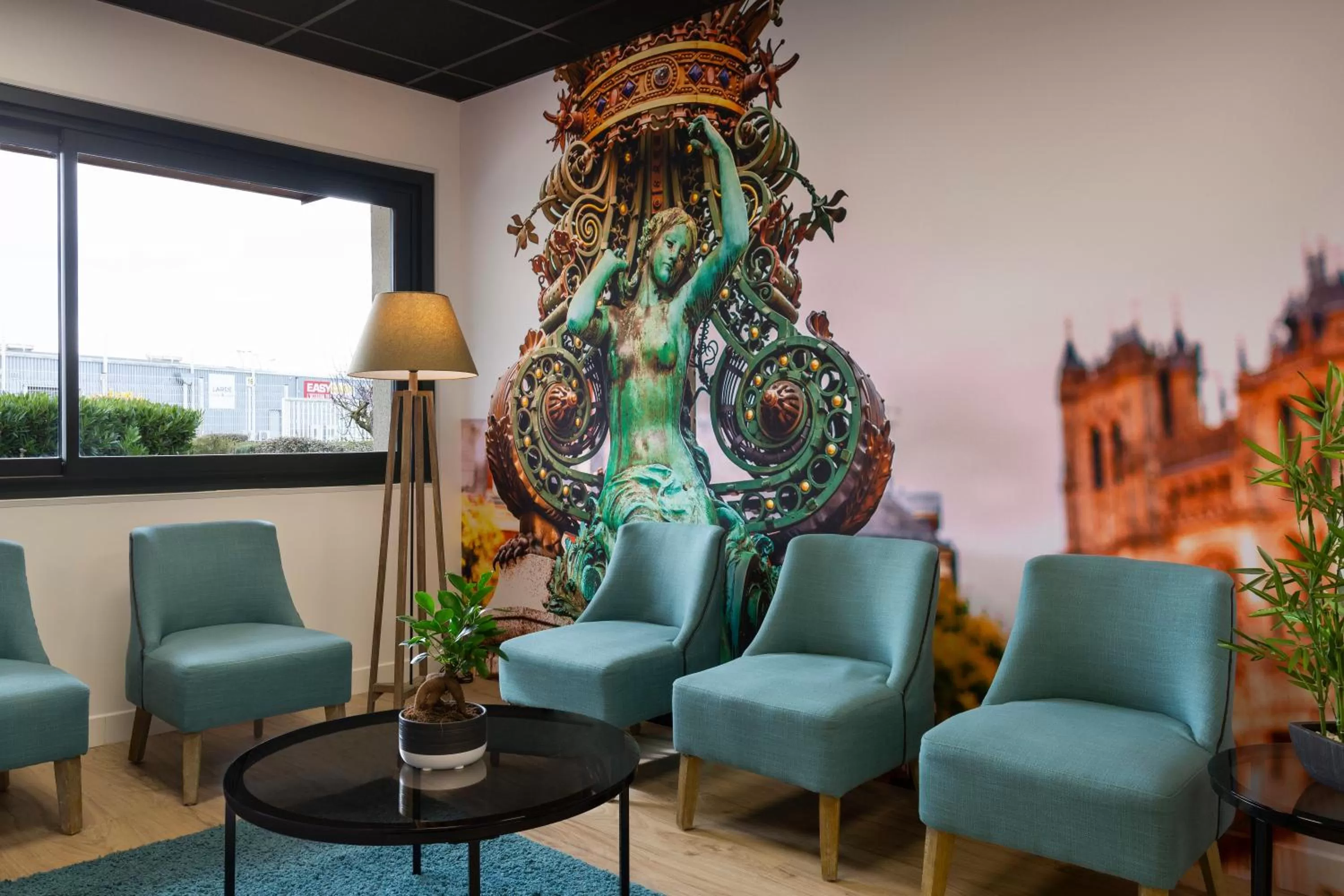 Living room in Brit Hotel Confort Amiens