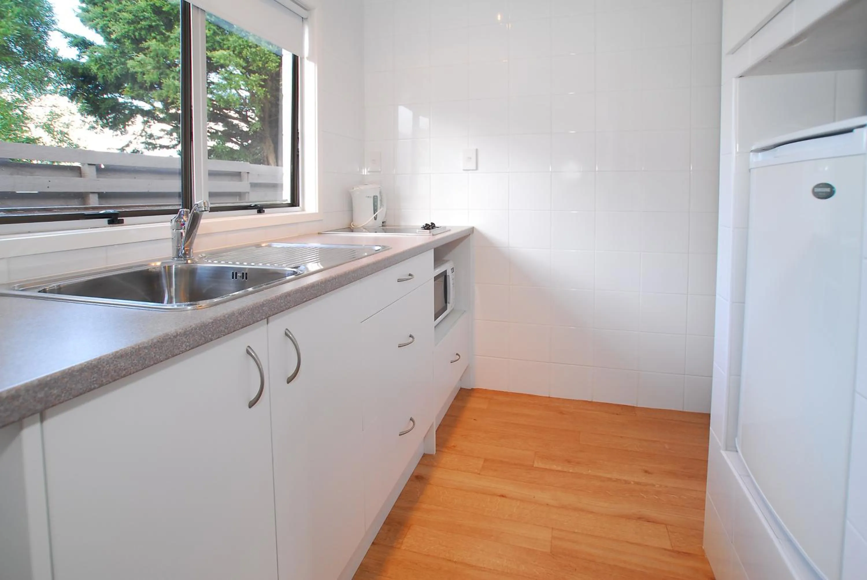 Kitchen or kitchenette in Takapuna Motor Lodge