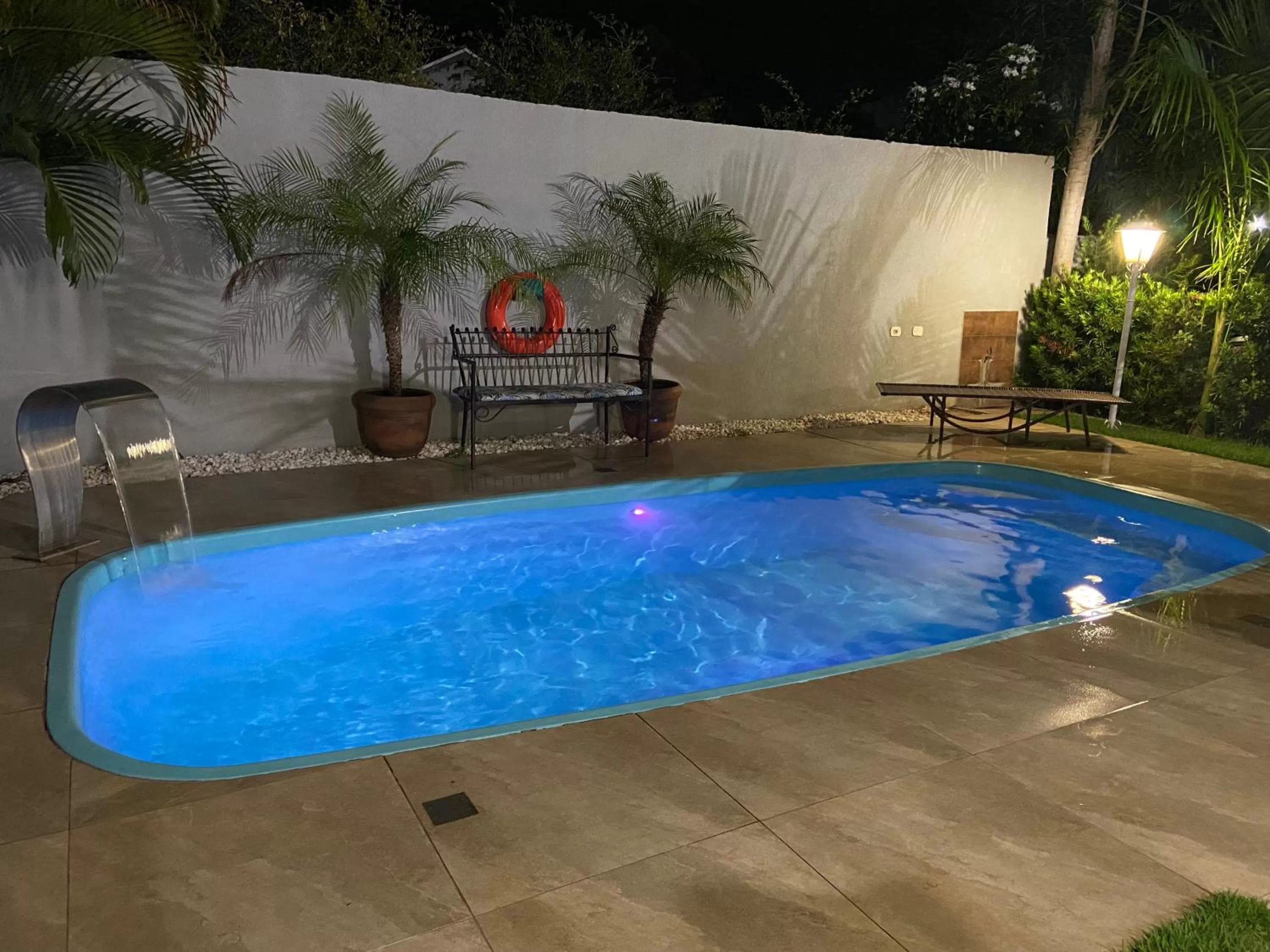 Swimming pool in Pousada Cambará Suítes