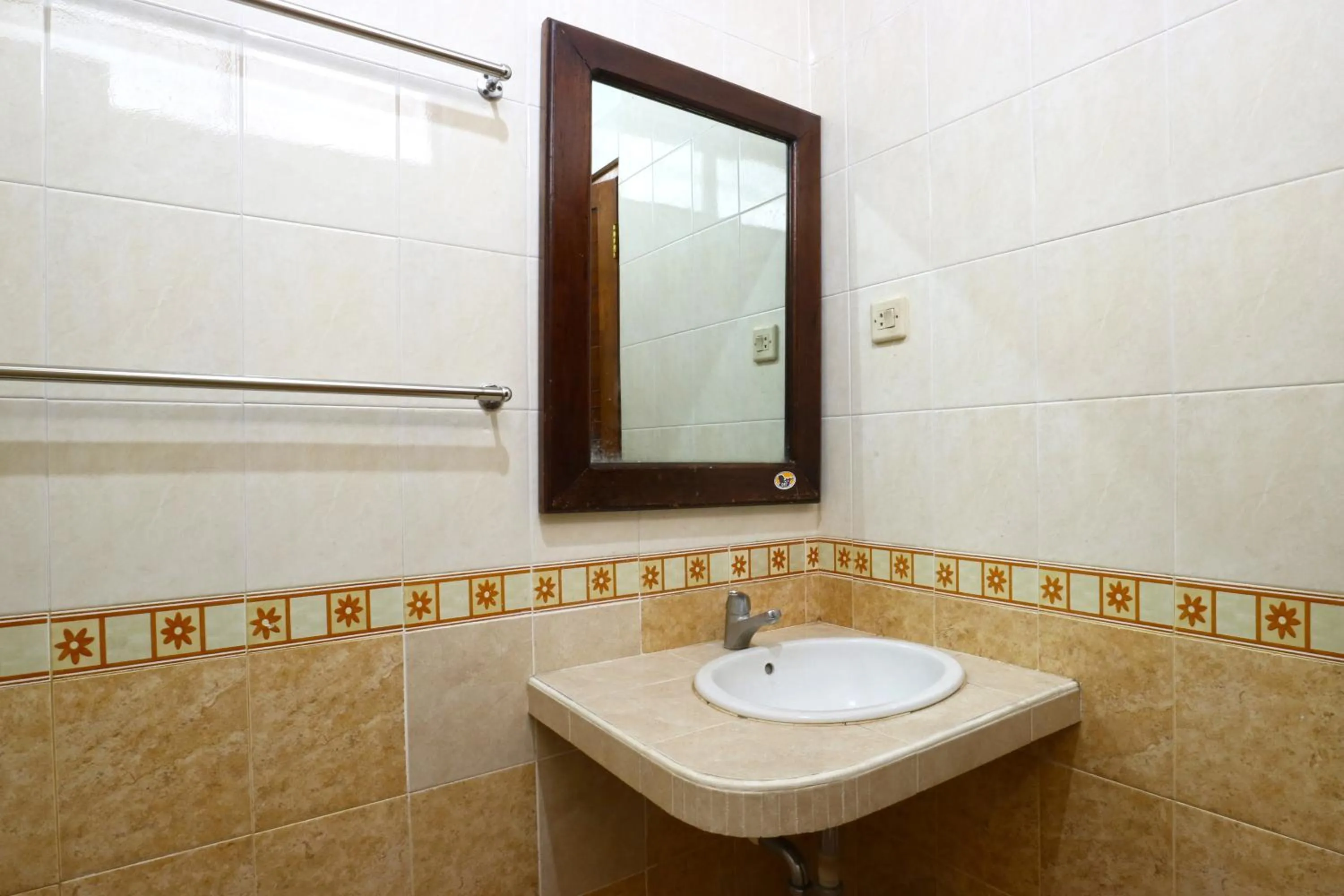 Bathroom in Gemini Star Hotel Kuta