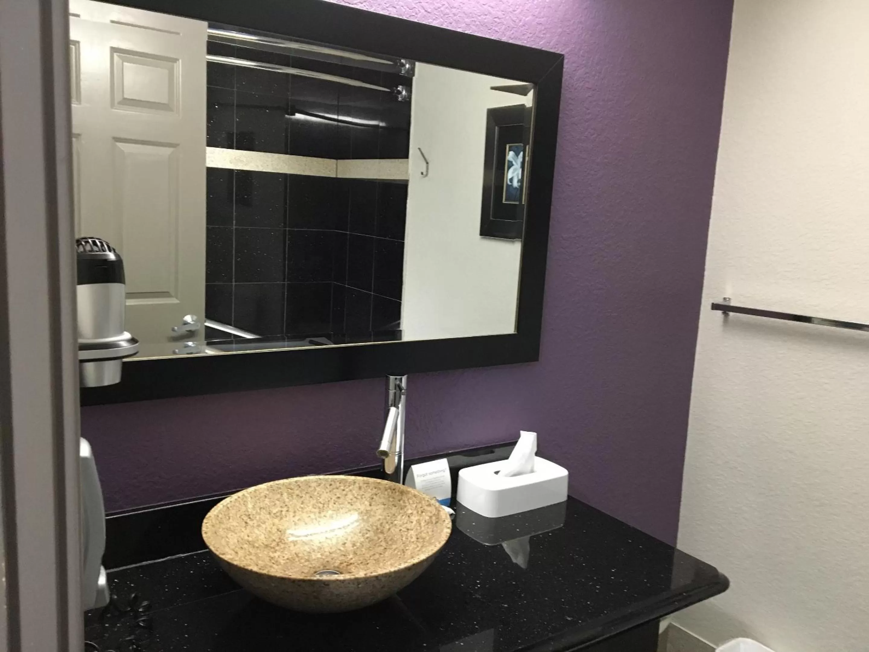 Bathroom in Days Inn & Suites by Wyndham Bonita Springs North Naples