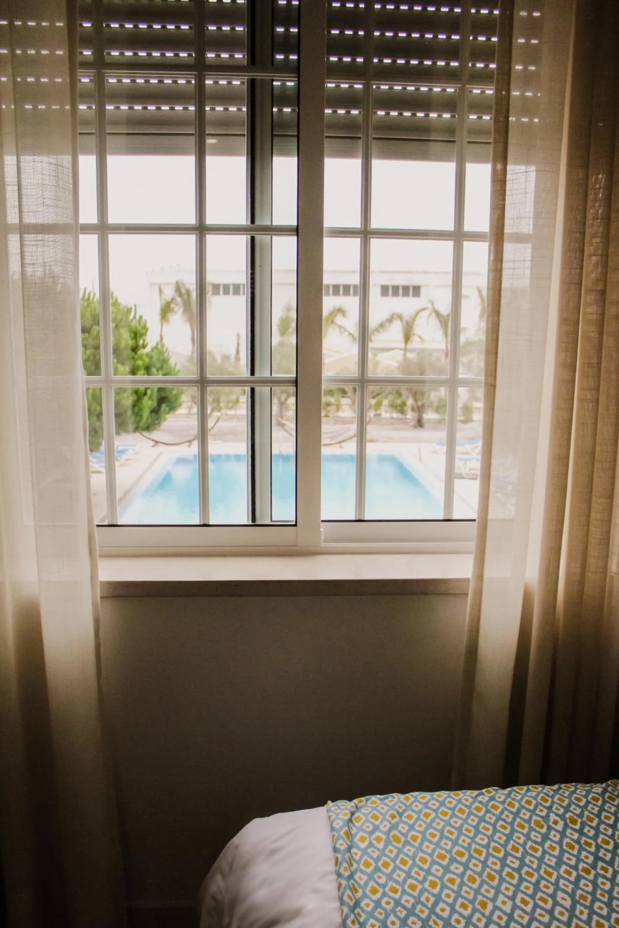 View (from property/room), Bed in Hotel Neptuno