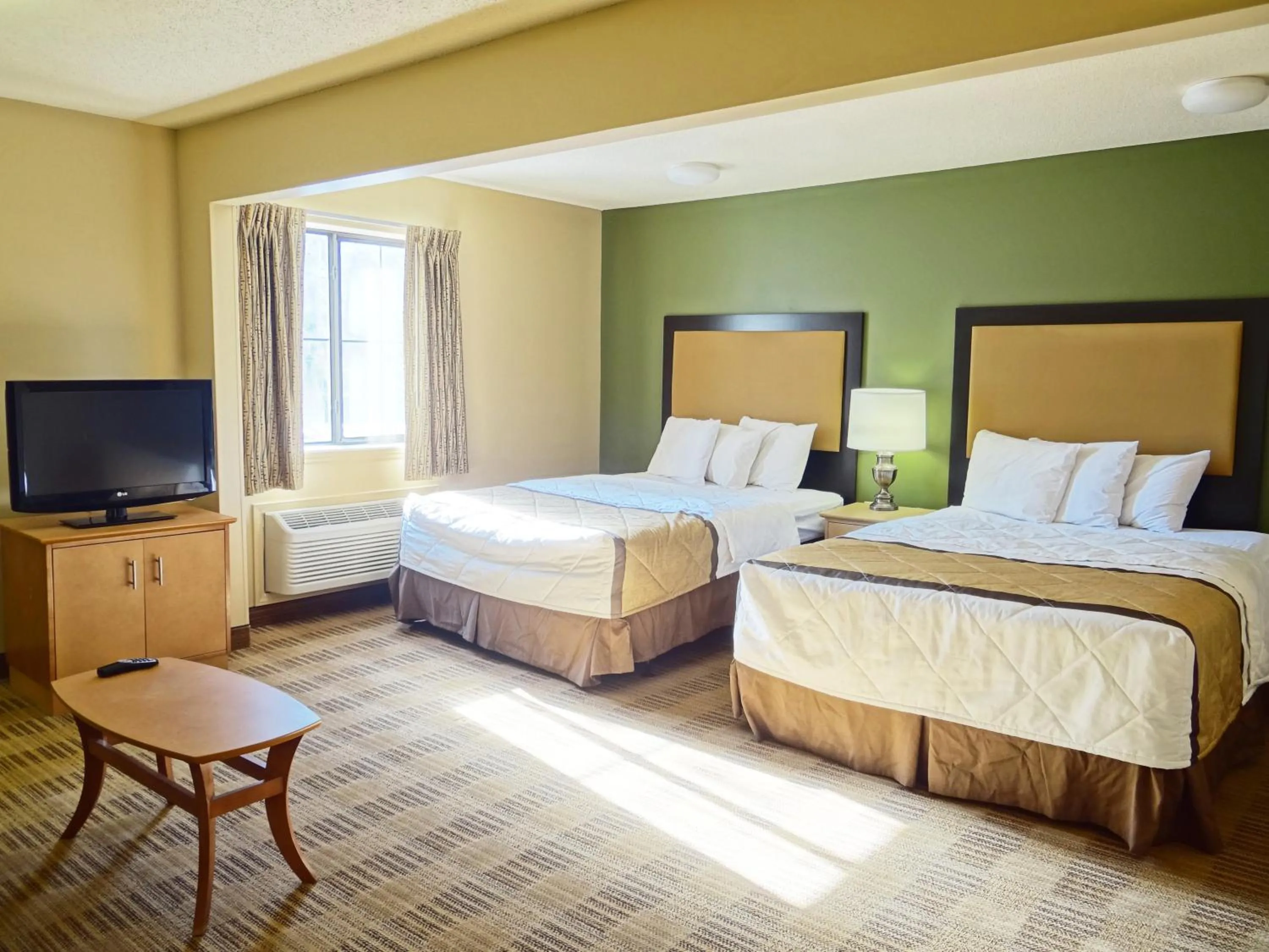 Bed in Extended Stay America Select Suites - Raleigh - Cary - Regency Parkway South