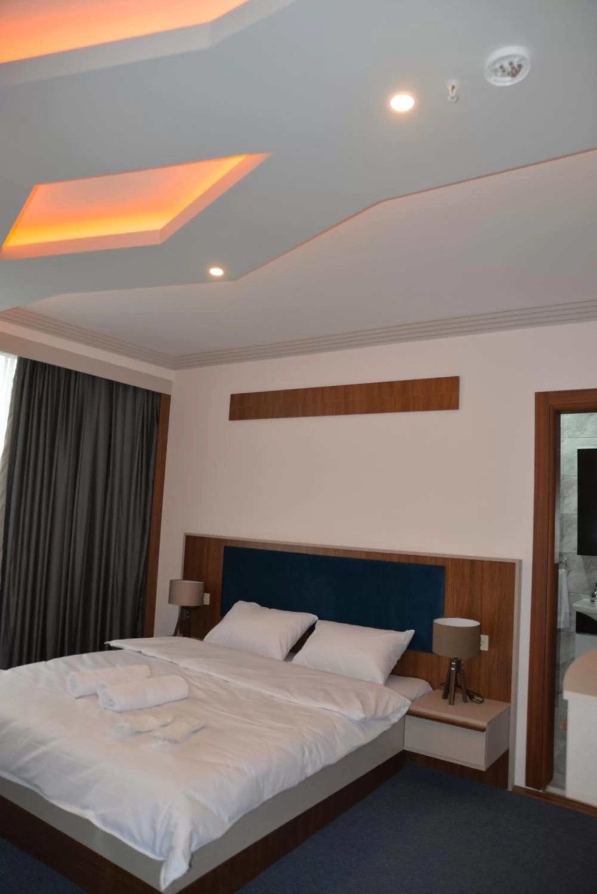 Bed in TEVETOGLU HOTEL