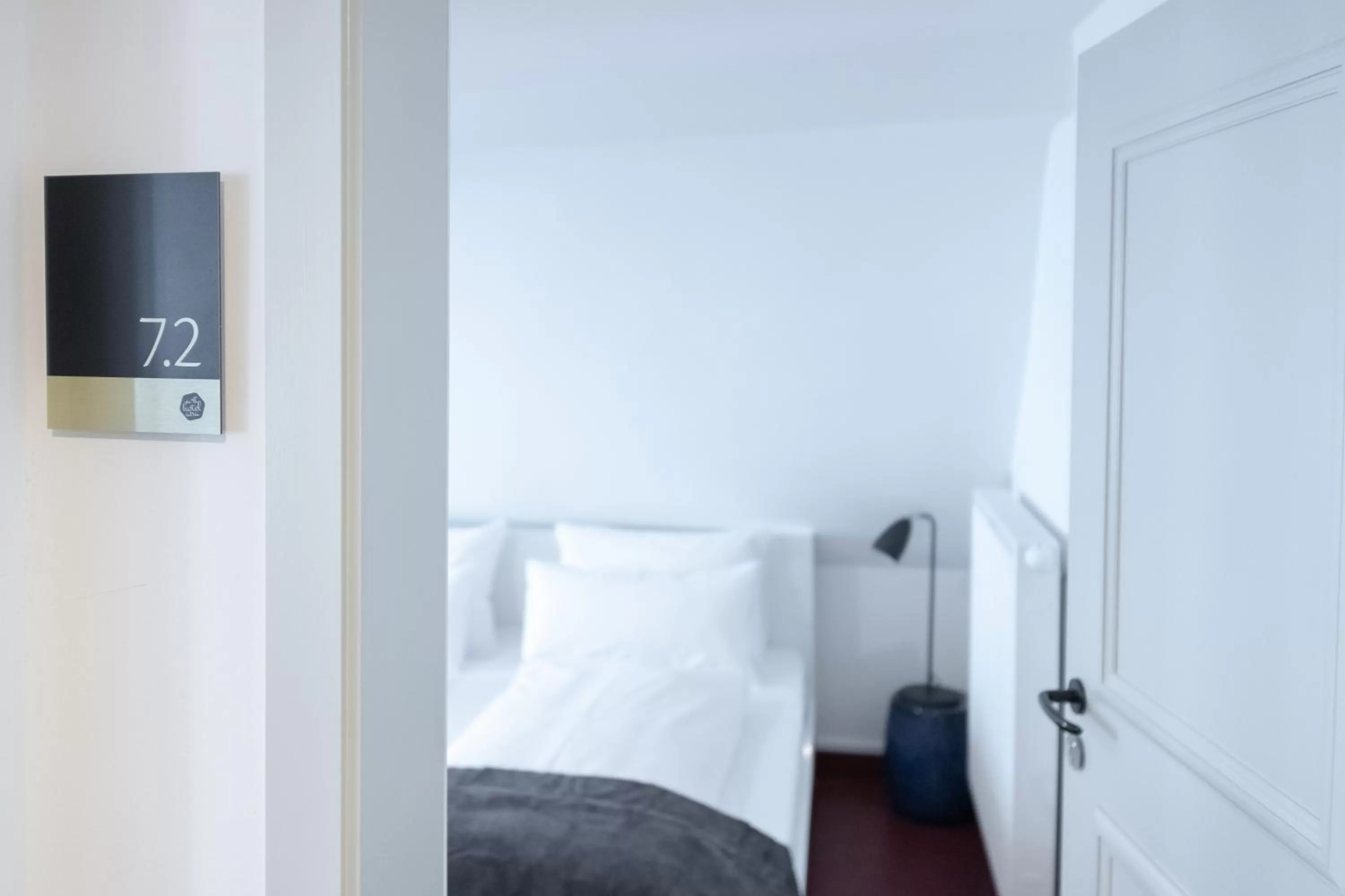 Photo of the whole room, Bed in ANA Living Augsburg City Center by Arthotel ANA - Self-Service-Hotel
