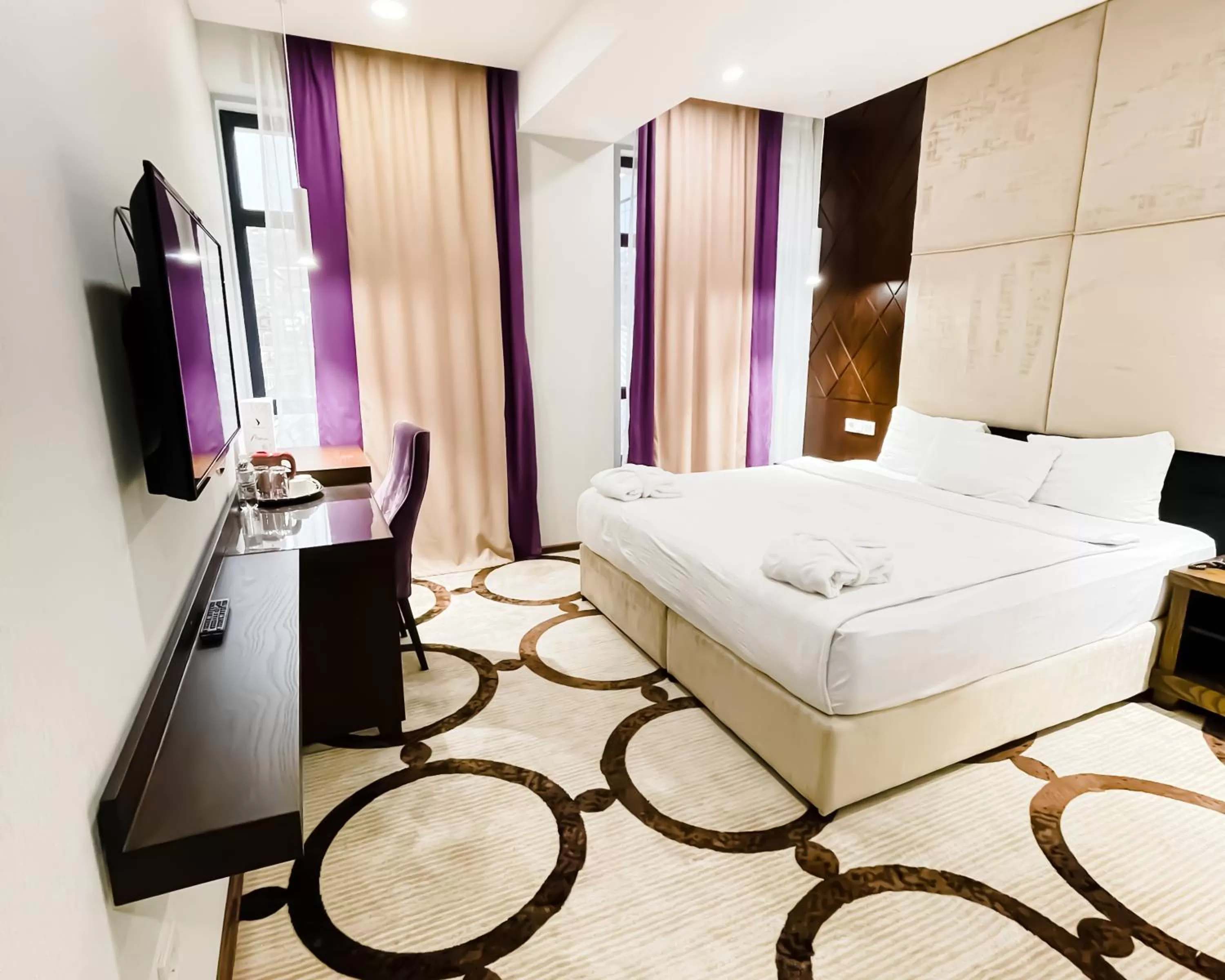 Bed in East Palace Hotel