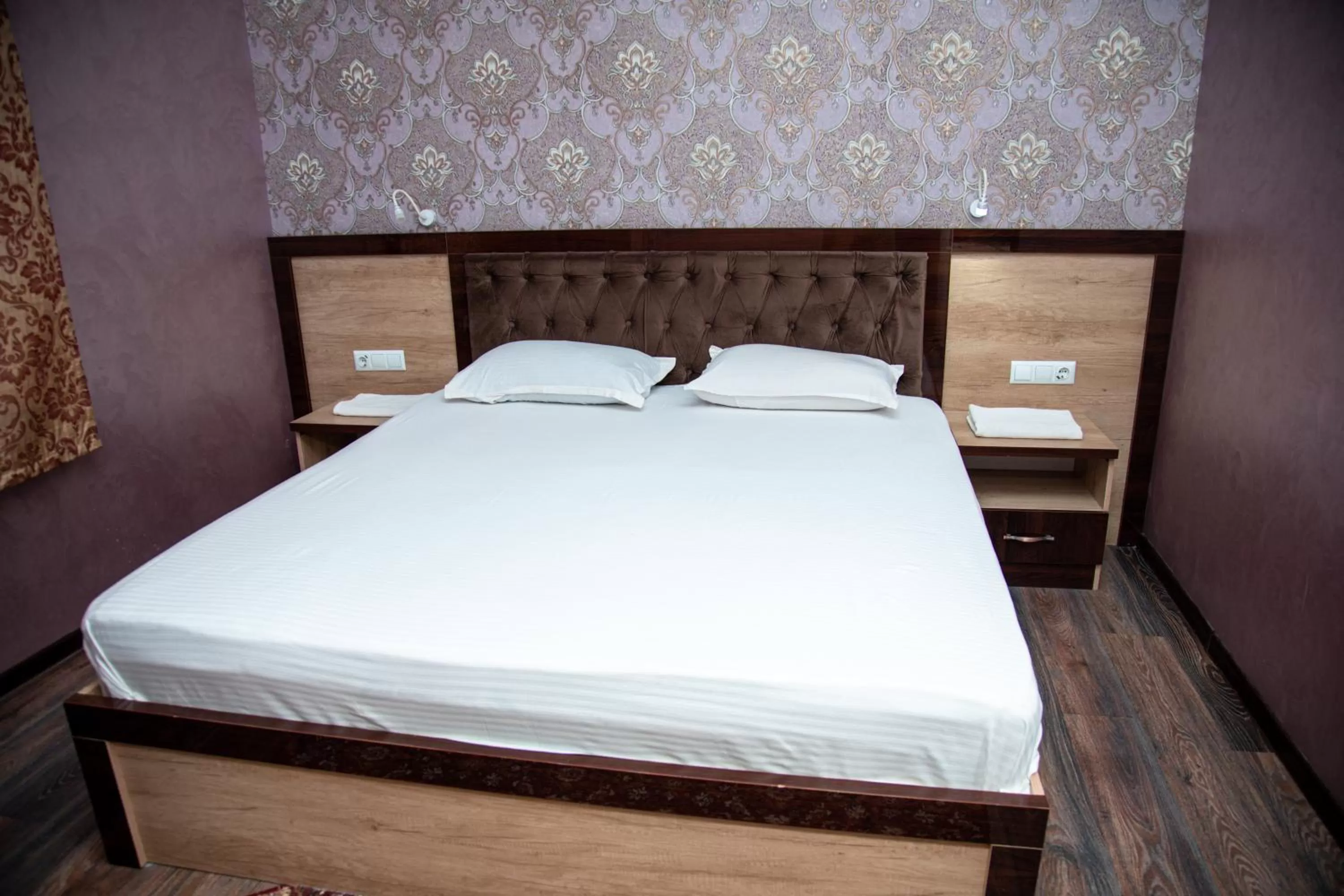 Bed in Armon Apart Hotel