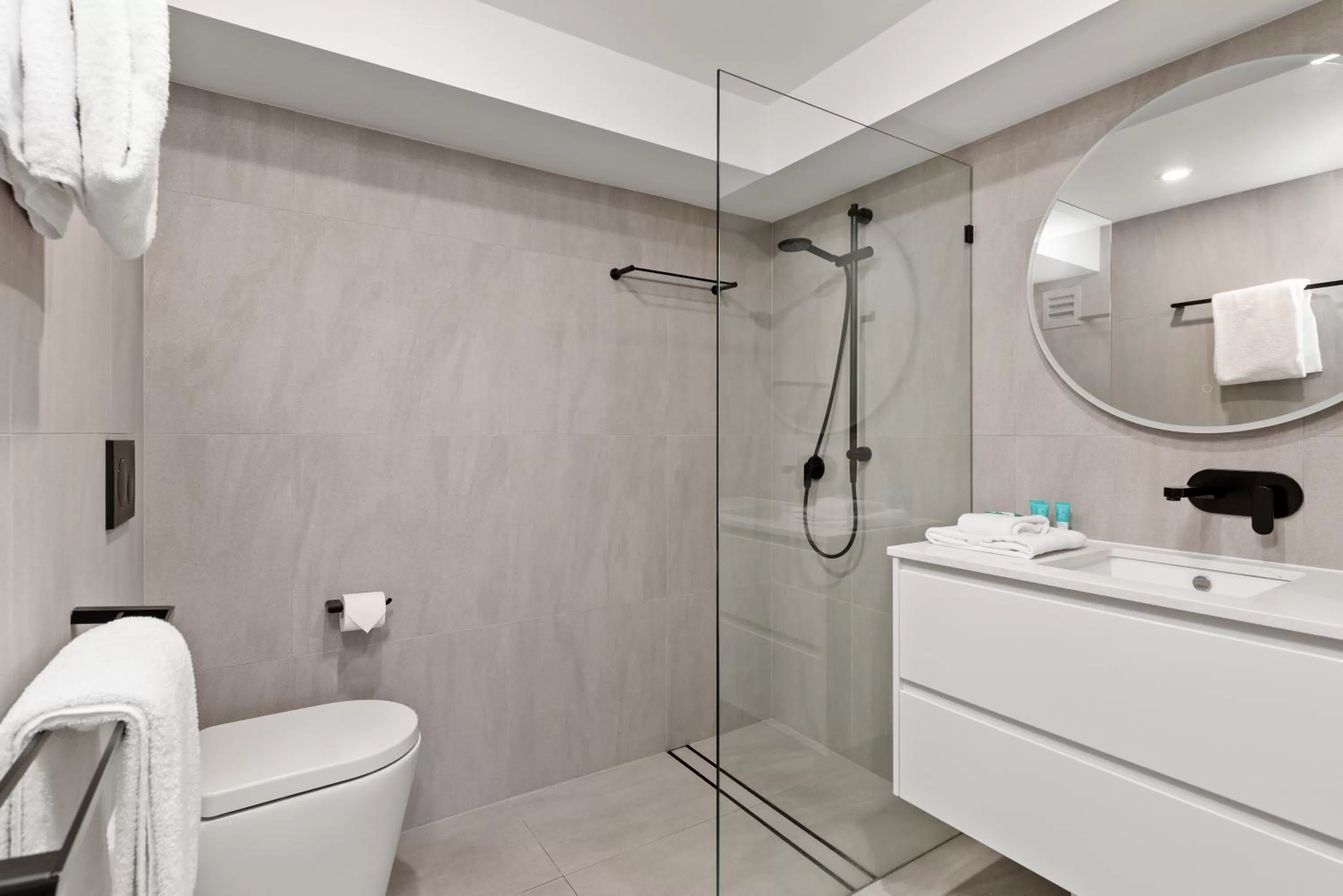 Bathroom in 84 The Spit Holiday Apartments