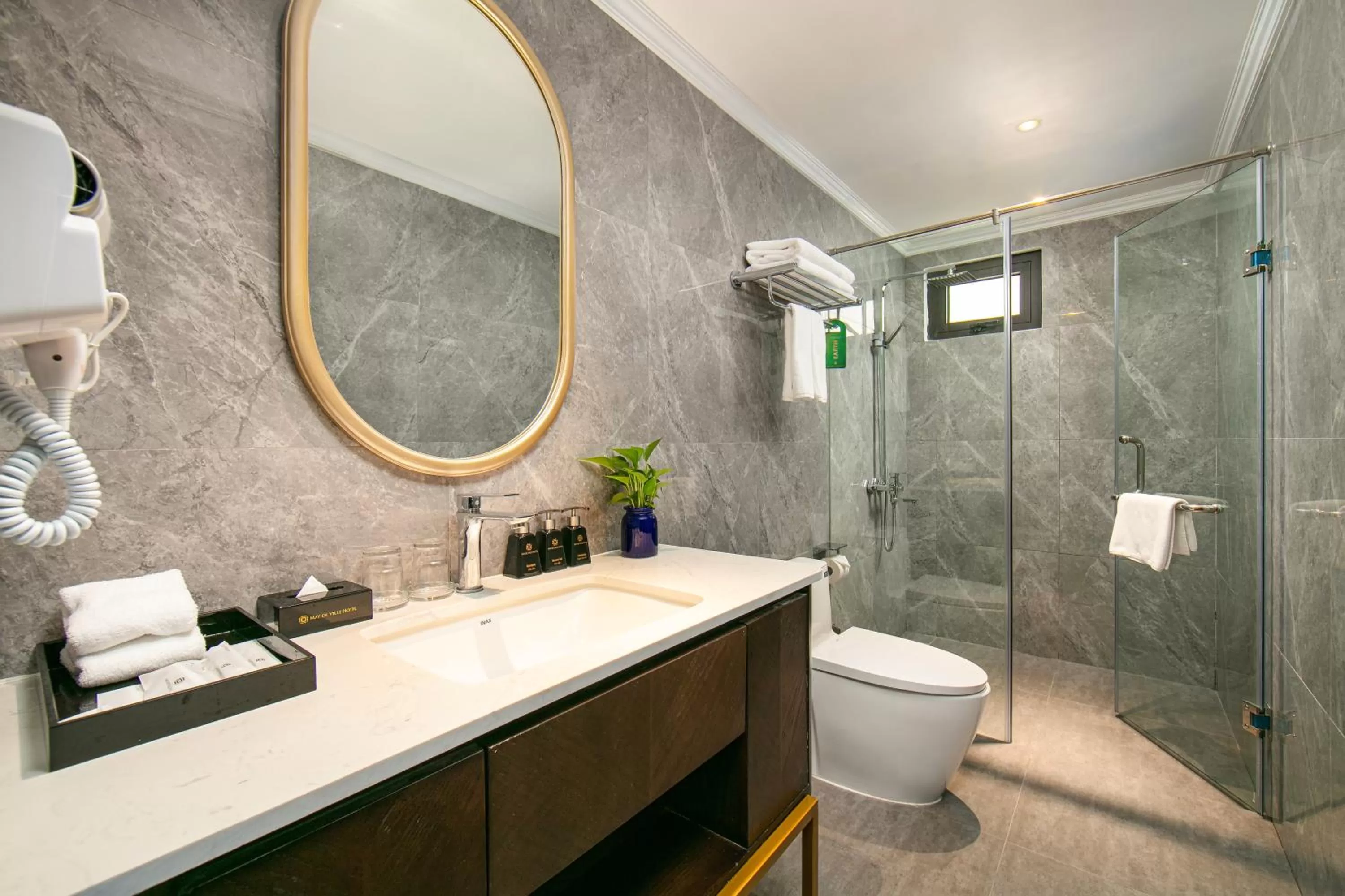 Bathroom in MAY DE VILLE Lakeside Hotel