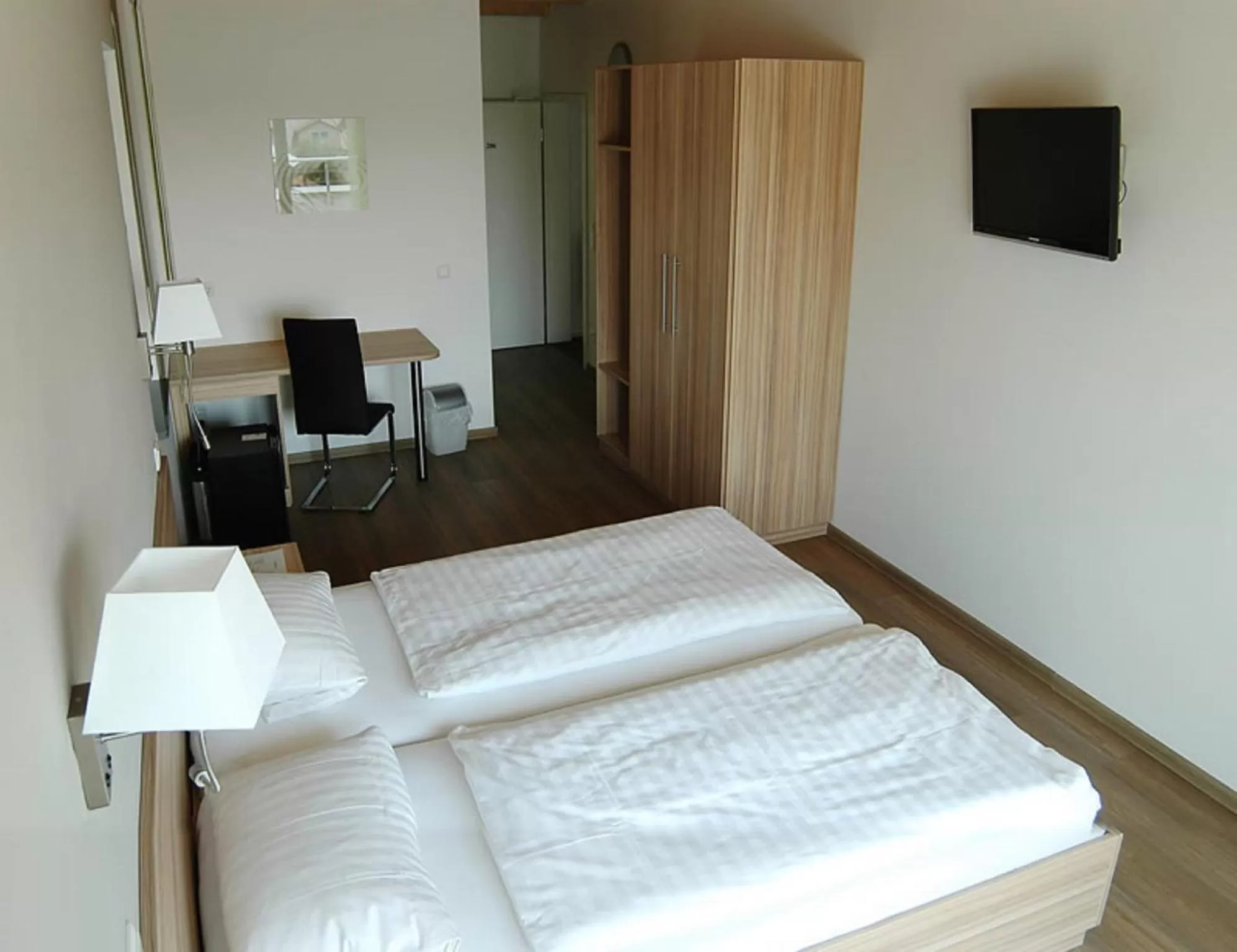 Bed in Hotel Fränkischer Hof