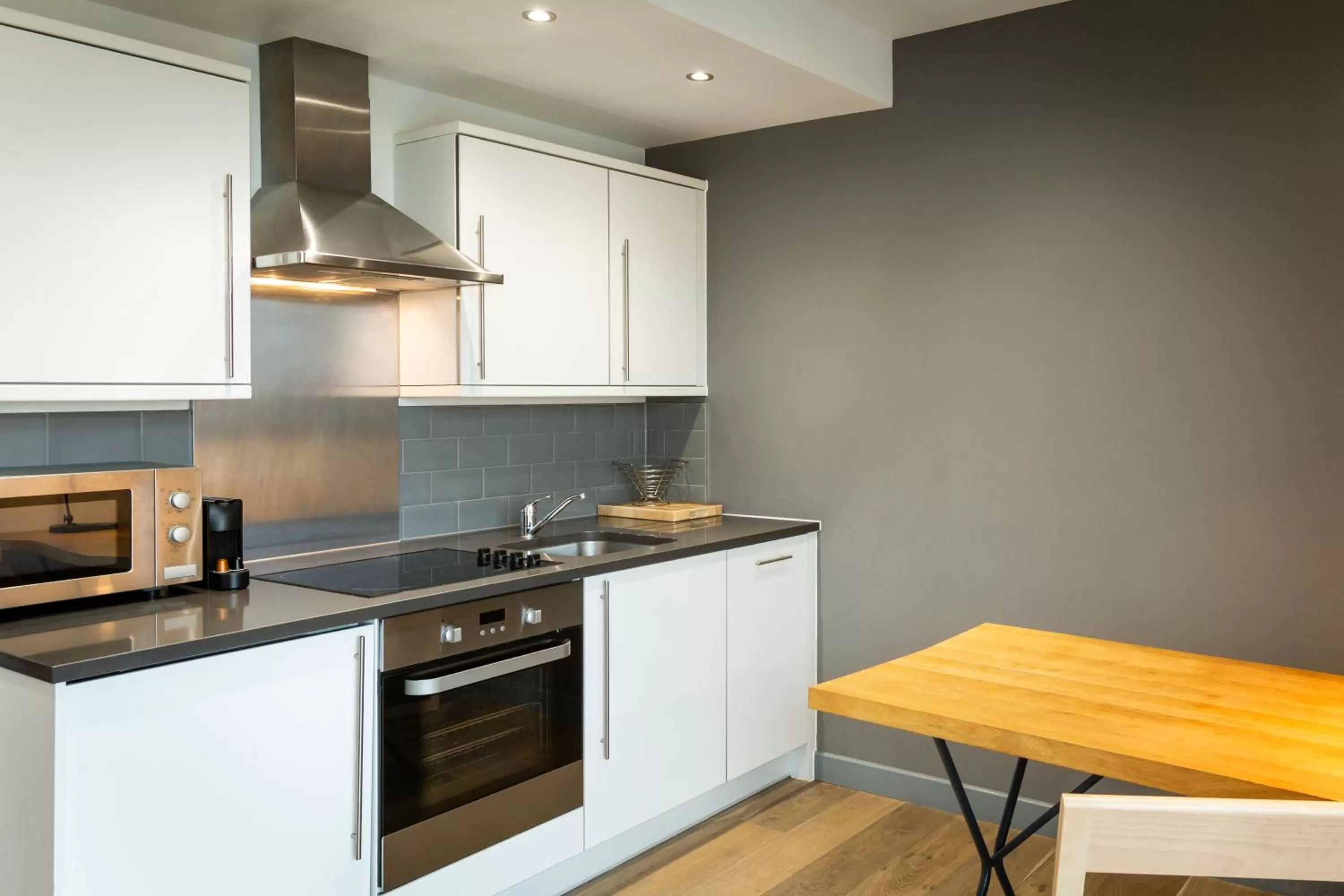 Kitchen or kitchenette in Aparthotel Adagio London Brentford