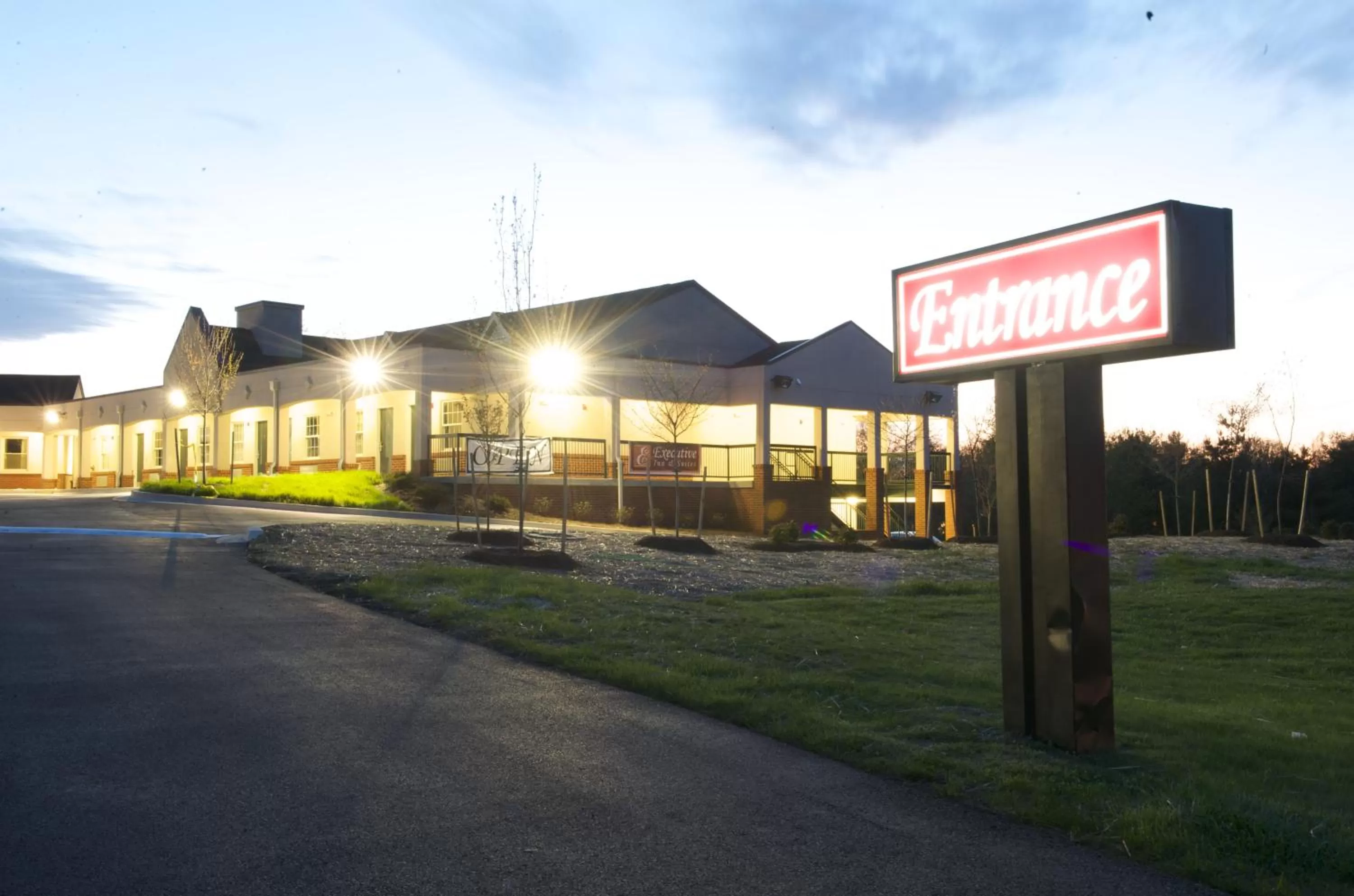 Property logo or sign in Executive Inn & Suites Upper Marlboro