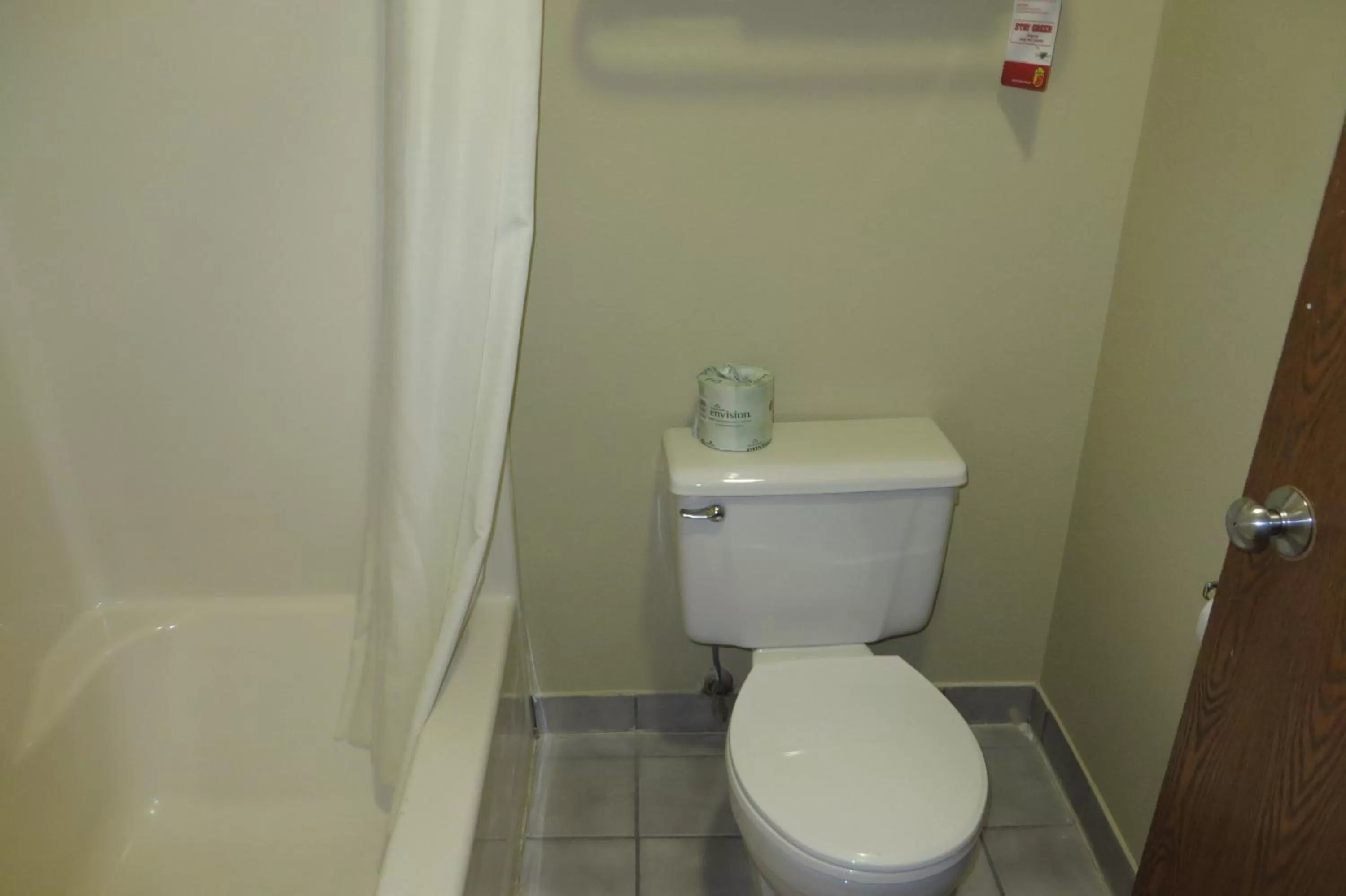 Bathroom in Super 8 by Wyndham Grinnell IA