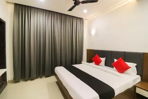 Bed in Hotel Nikhil Regency