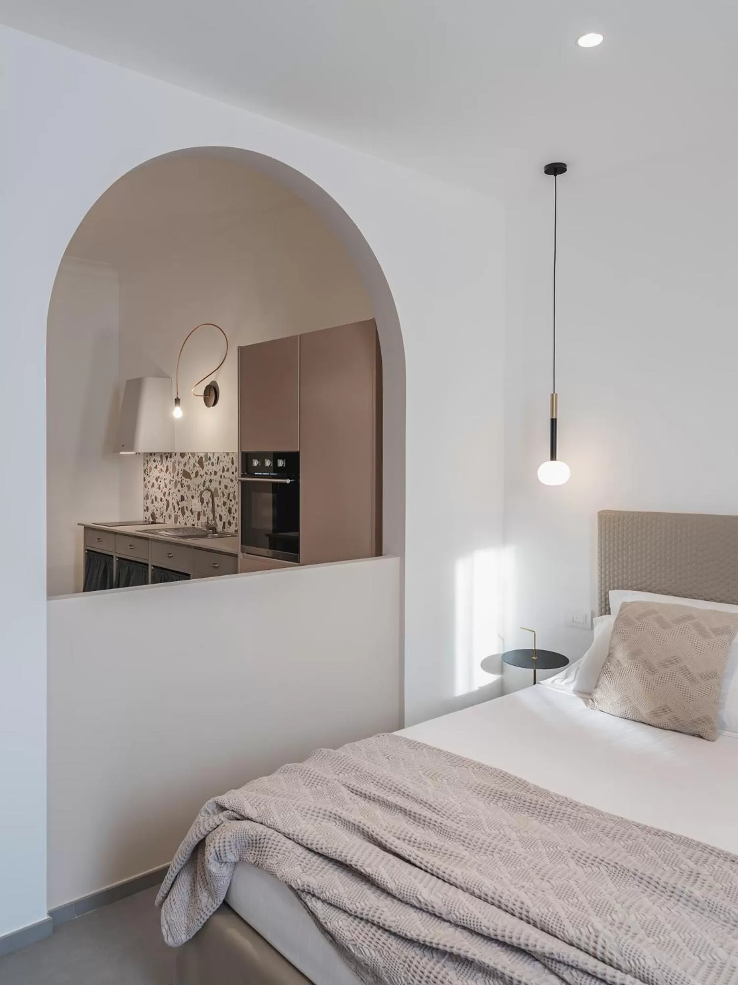 Bed in Living u HomeSuites