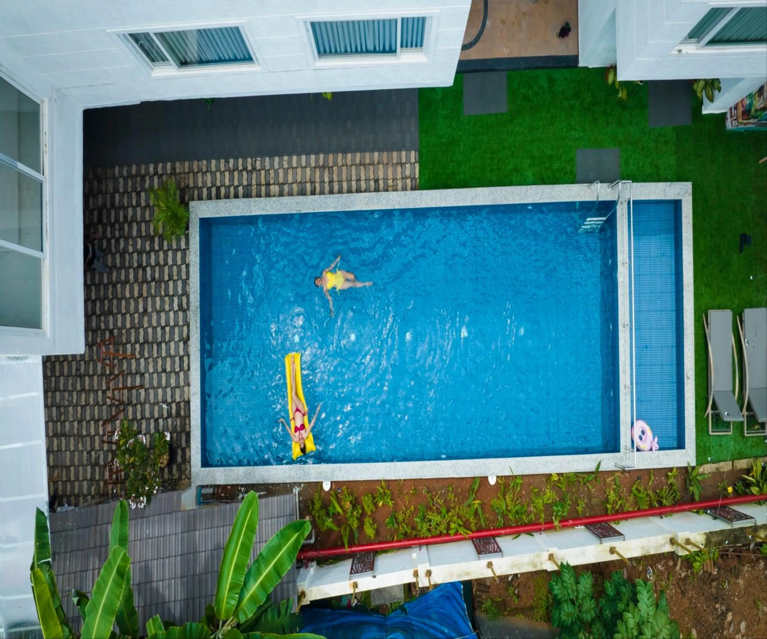 Swimming pool in HUE GUH The Porto Candolim