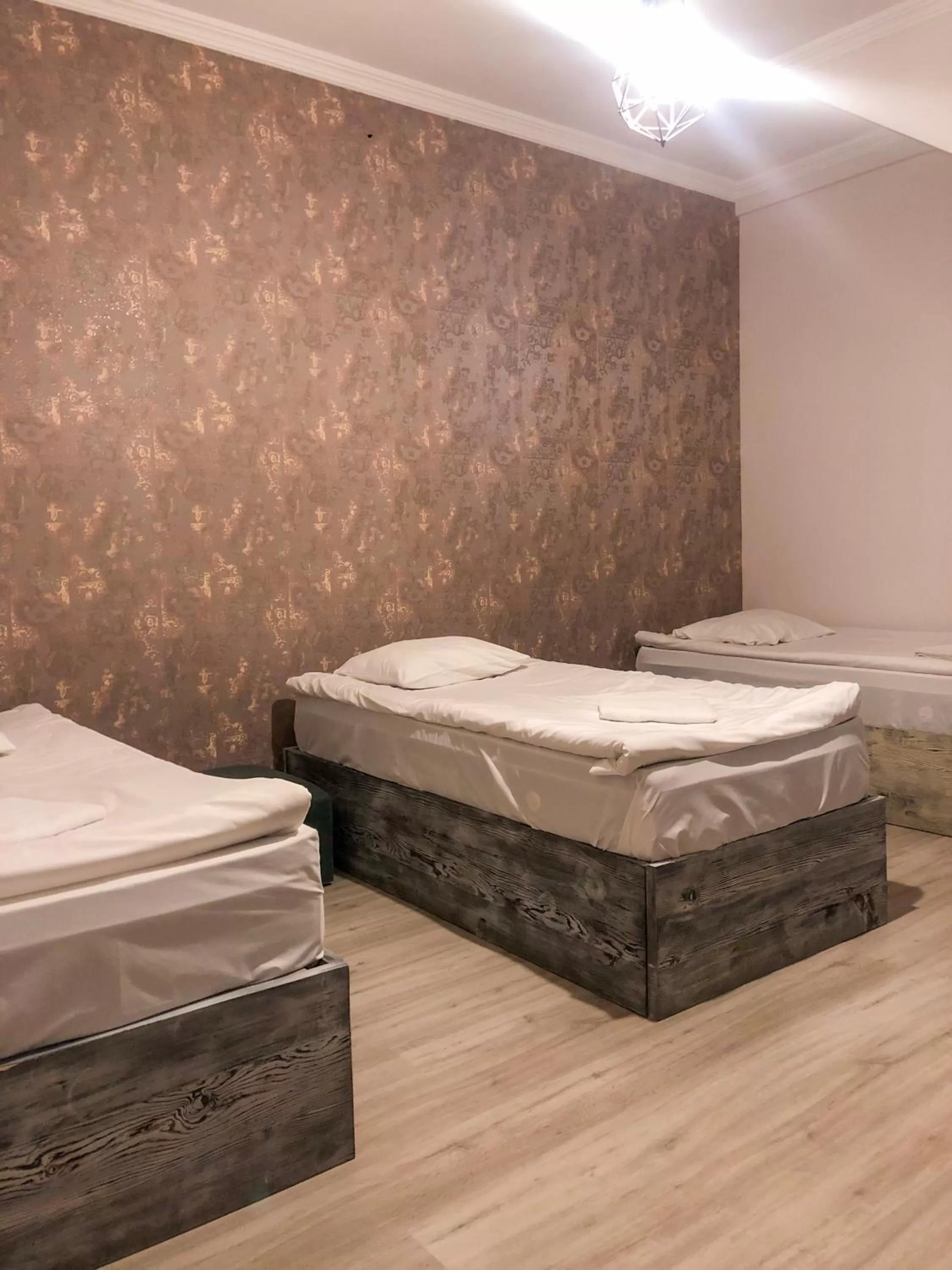 Bedroom in Check Point Hotel