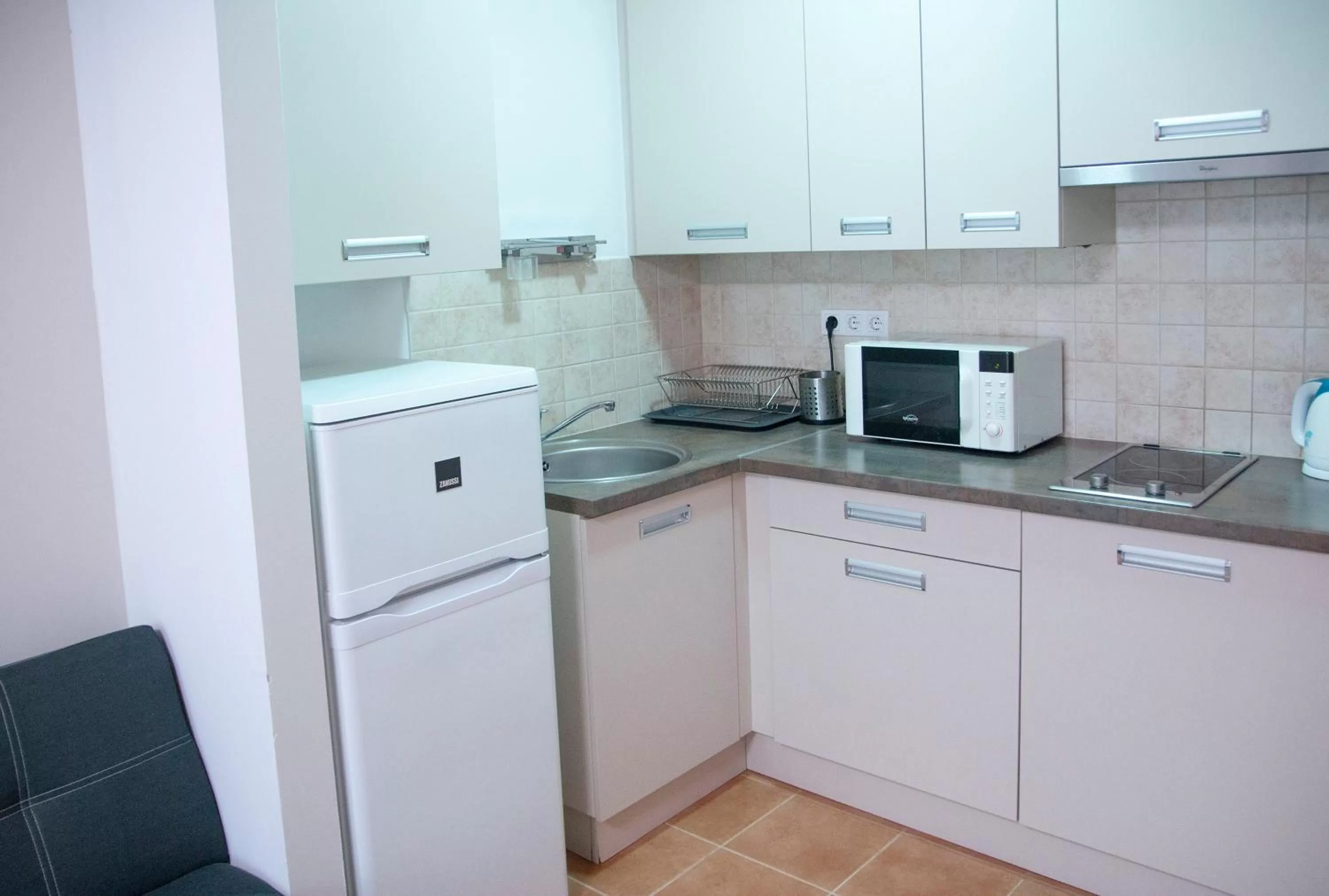 Kitchen or kitchenette in Keleti Aparthotel