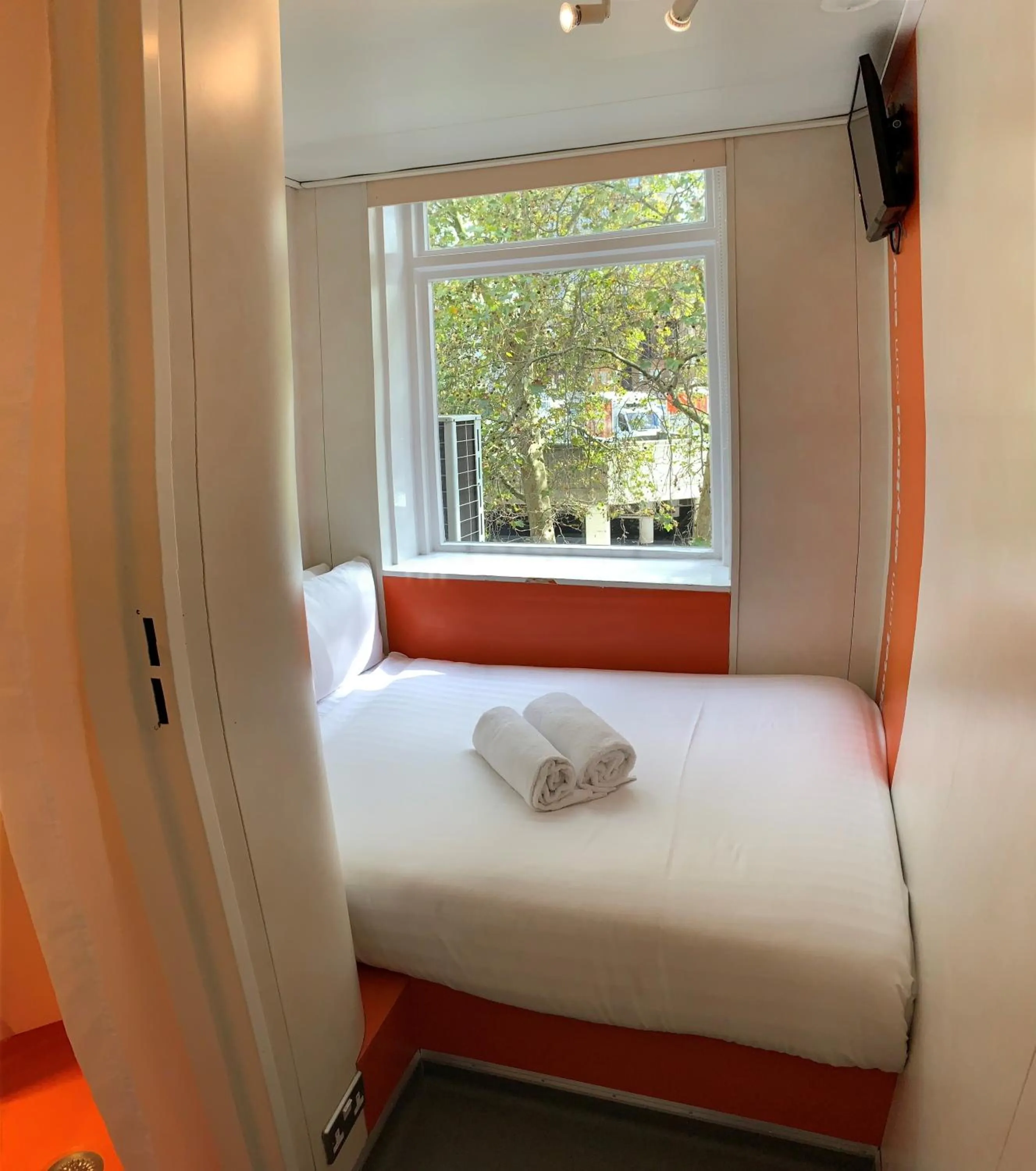 Photo of the whole room, Bed in easyHotel South Kensington