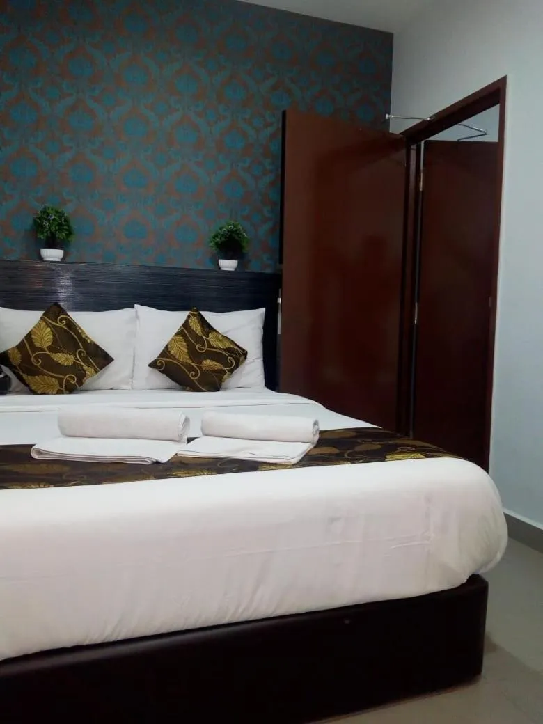 Bed in D'Metro Hotel