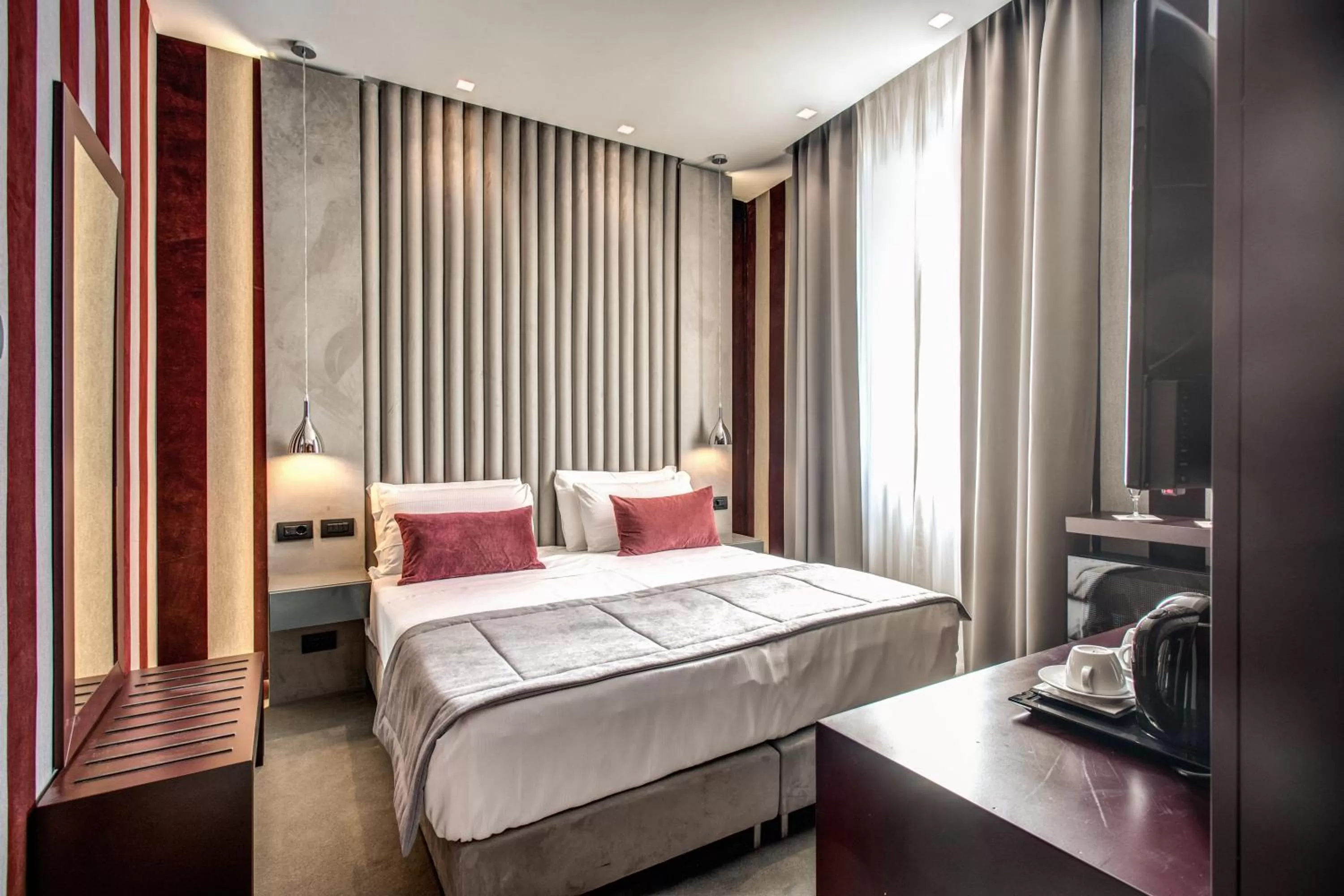 Bed in Doria Palace Boutique Hotel