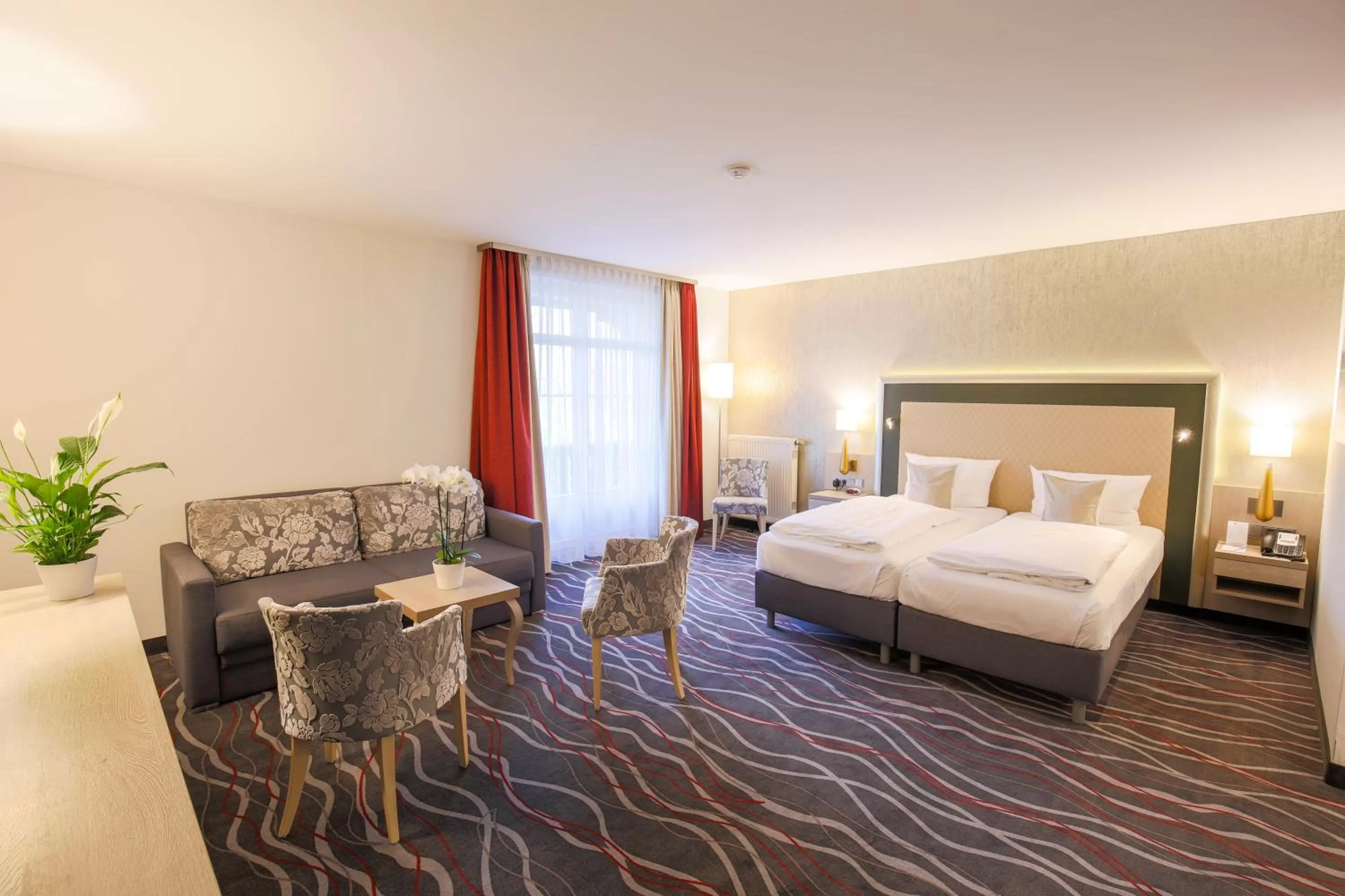 Photo of the whole room, Bed in Hotel Bayerischer Hof Miesbach, BW Premier Collection