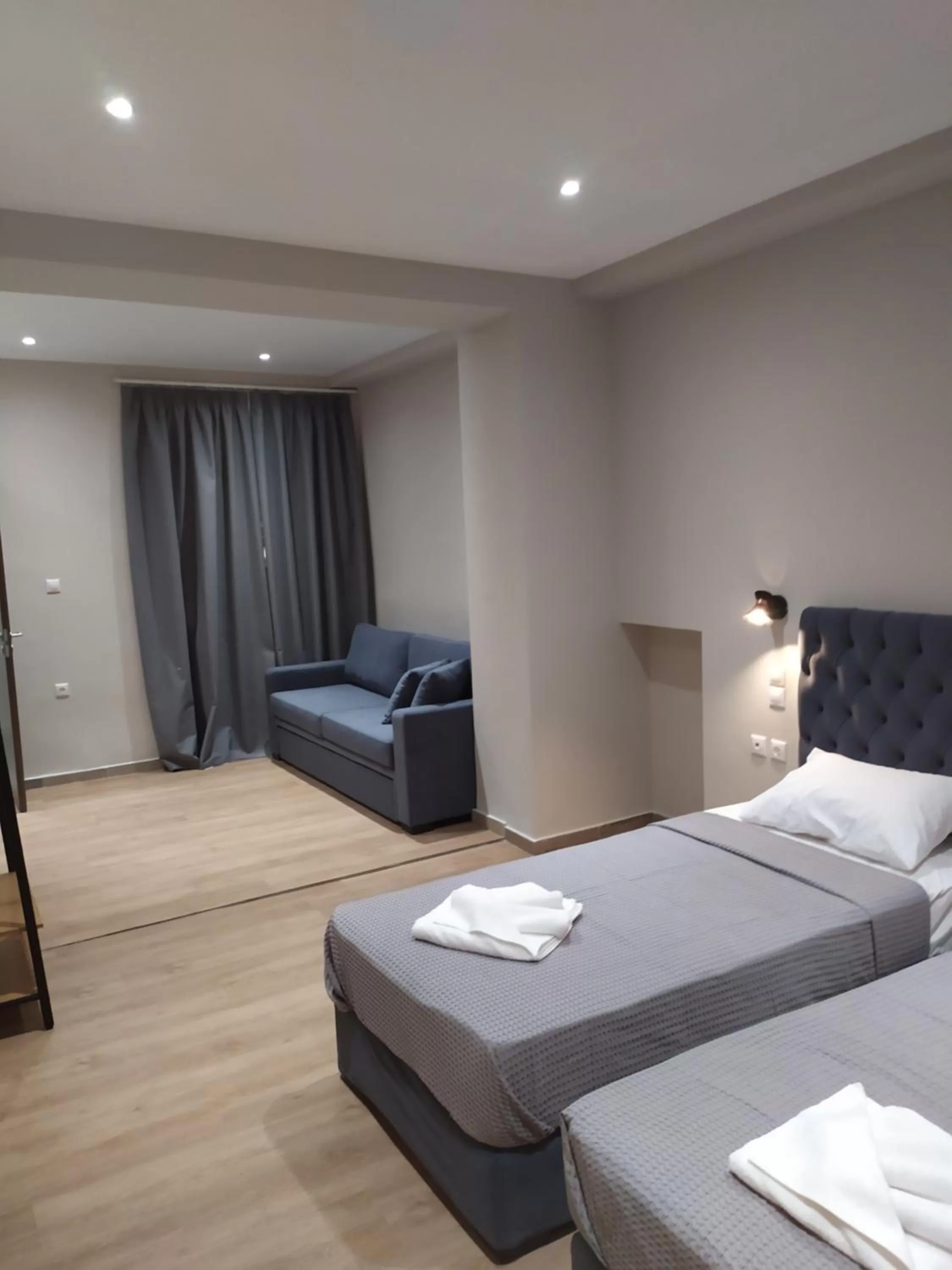 Bed in New Amaryllis Hotel