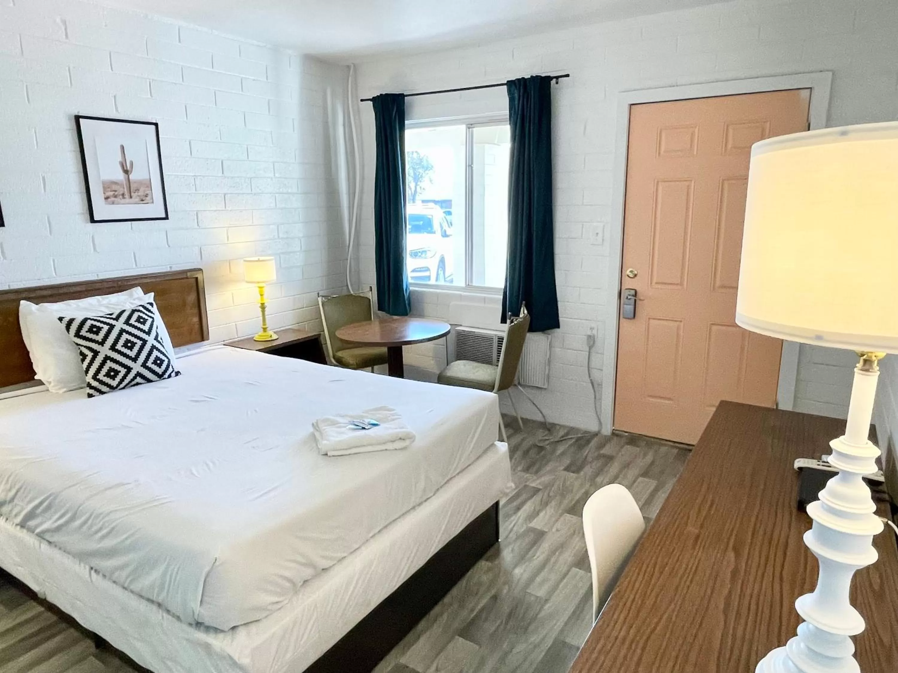 Bed in The Postcard Motel