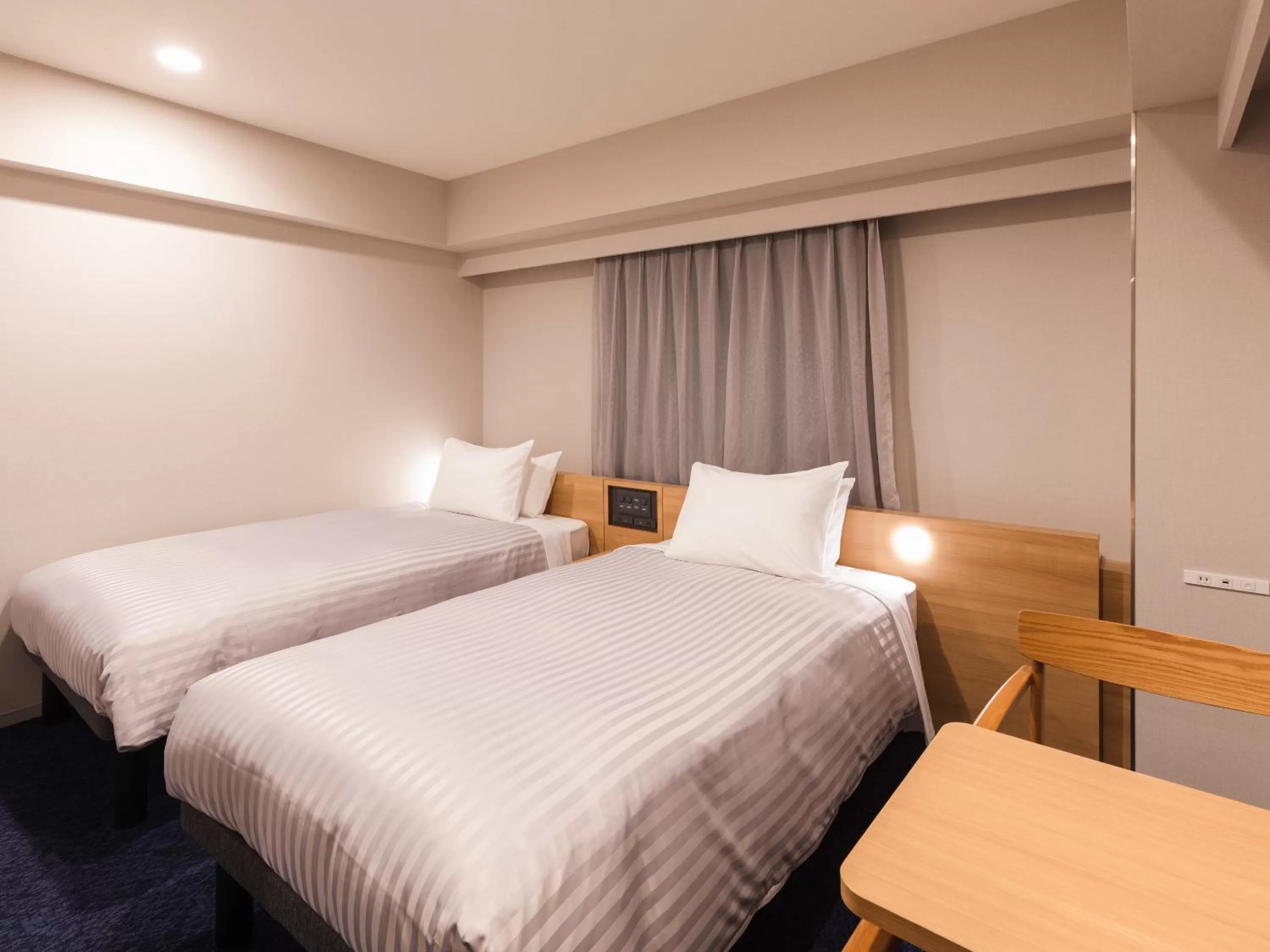 Photo of the whole room, Bed in Sotetsu Fresa Inn Nagoya-Shinkansenguchi
