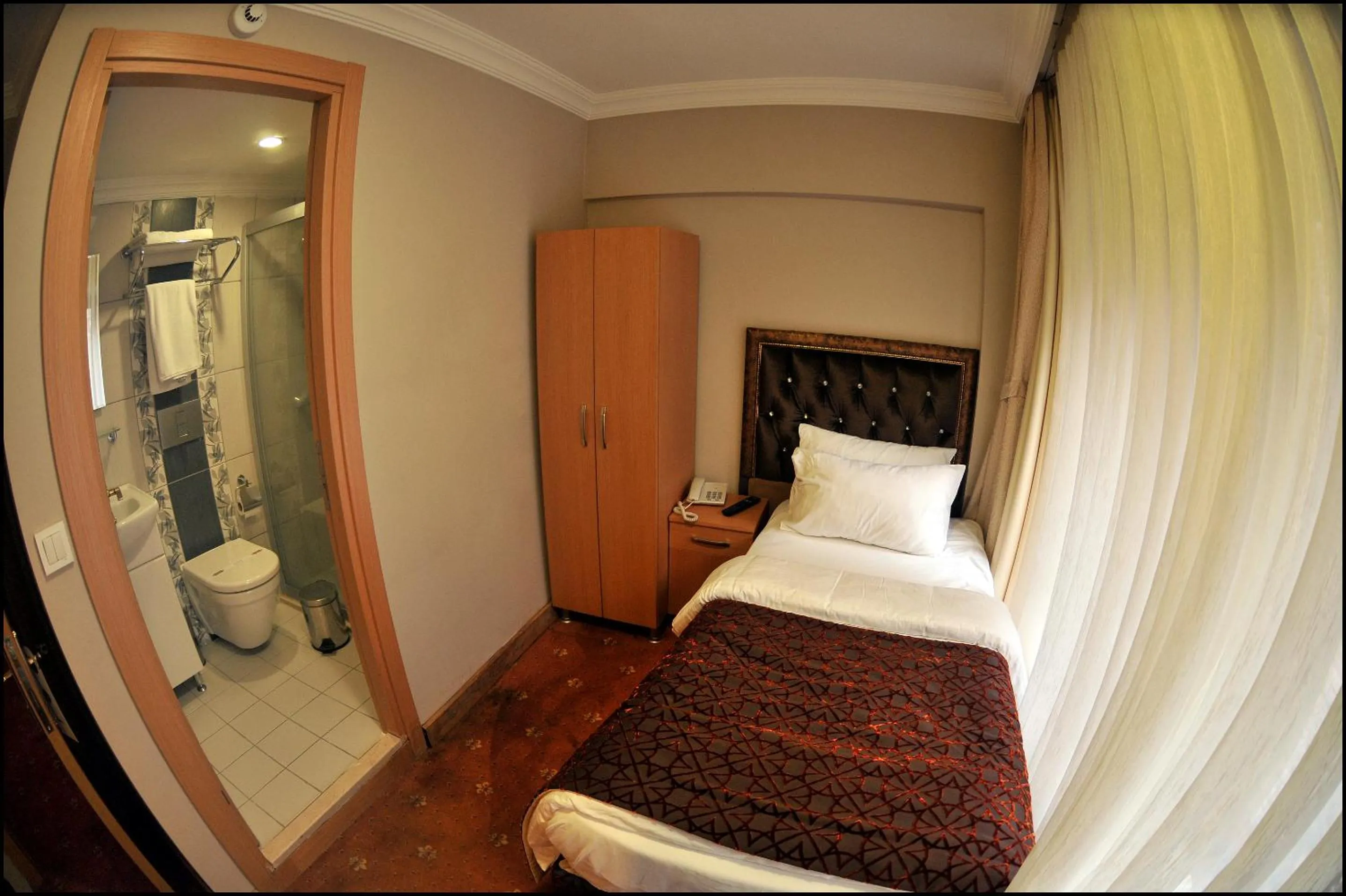 Bed in Palace Point Hotel